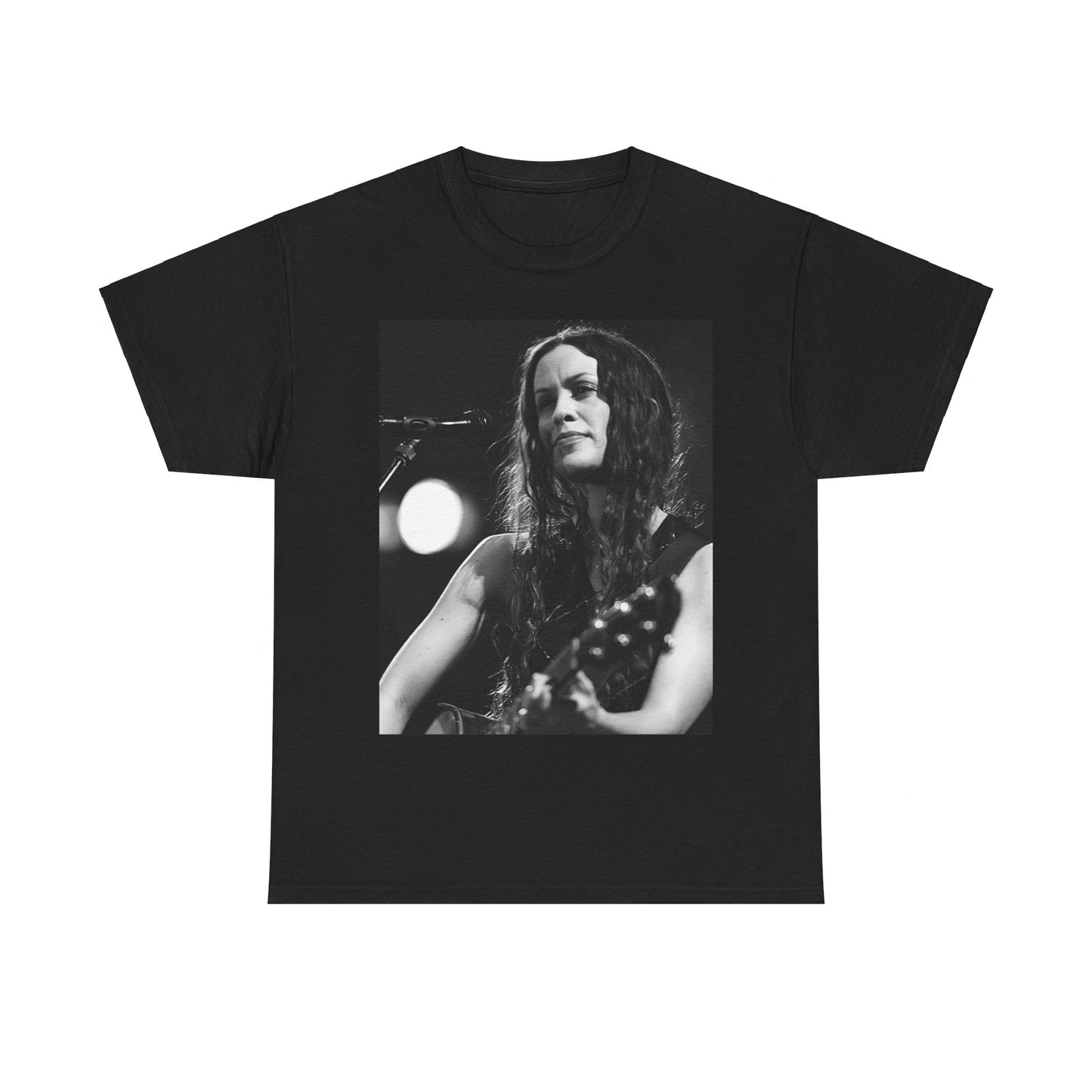 A black graphic t-shirt featuring a 90s-style graphic of Alanis Morissette playing a guitar, with a dynamic expression.