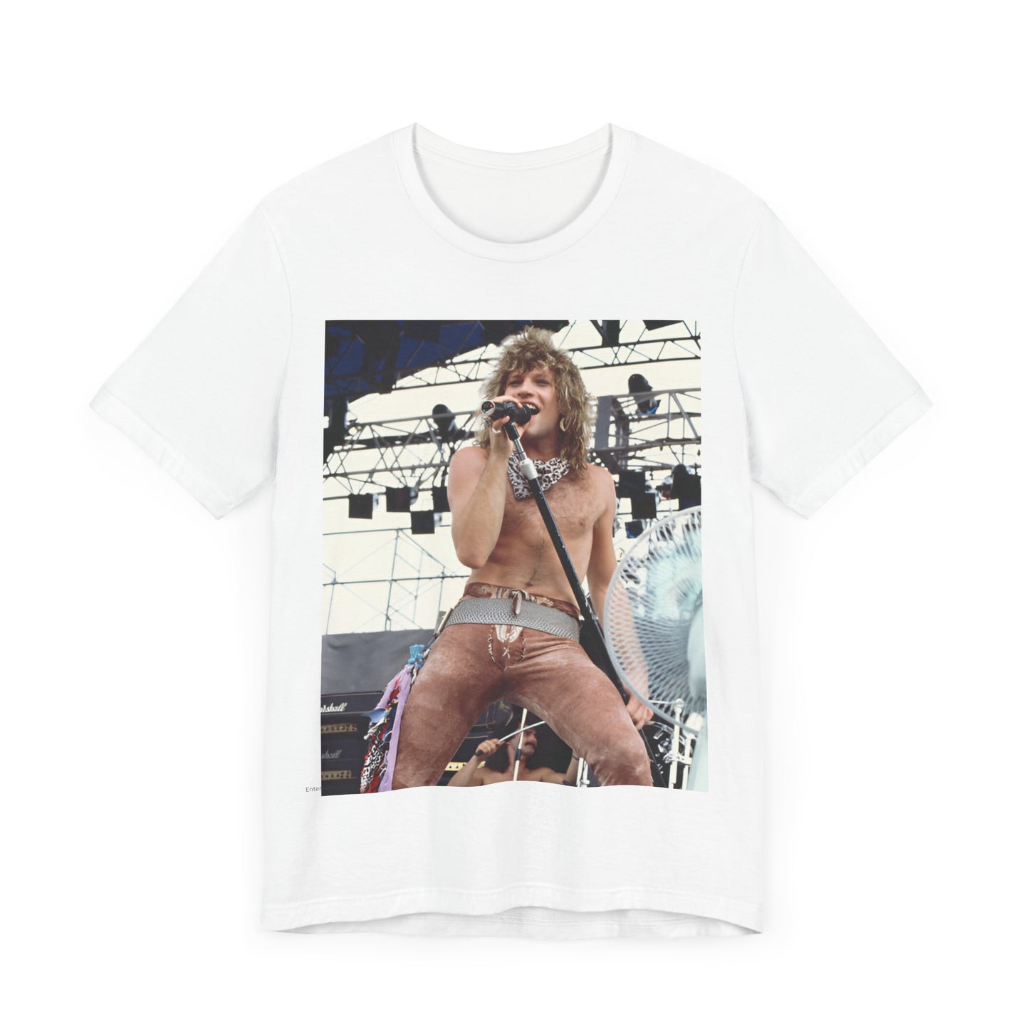 A black graphic t-shirt featuring a dynamic graphic or photo of Bon Jovi performing live on stage with a fierce intensity.