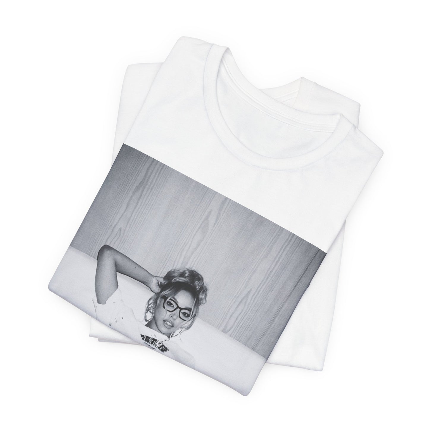 A black graphic t-shirt featuring a black and white portrait photo of Tinashe.