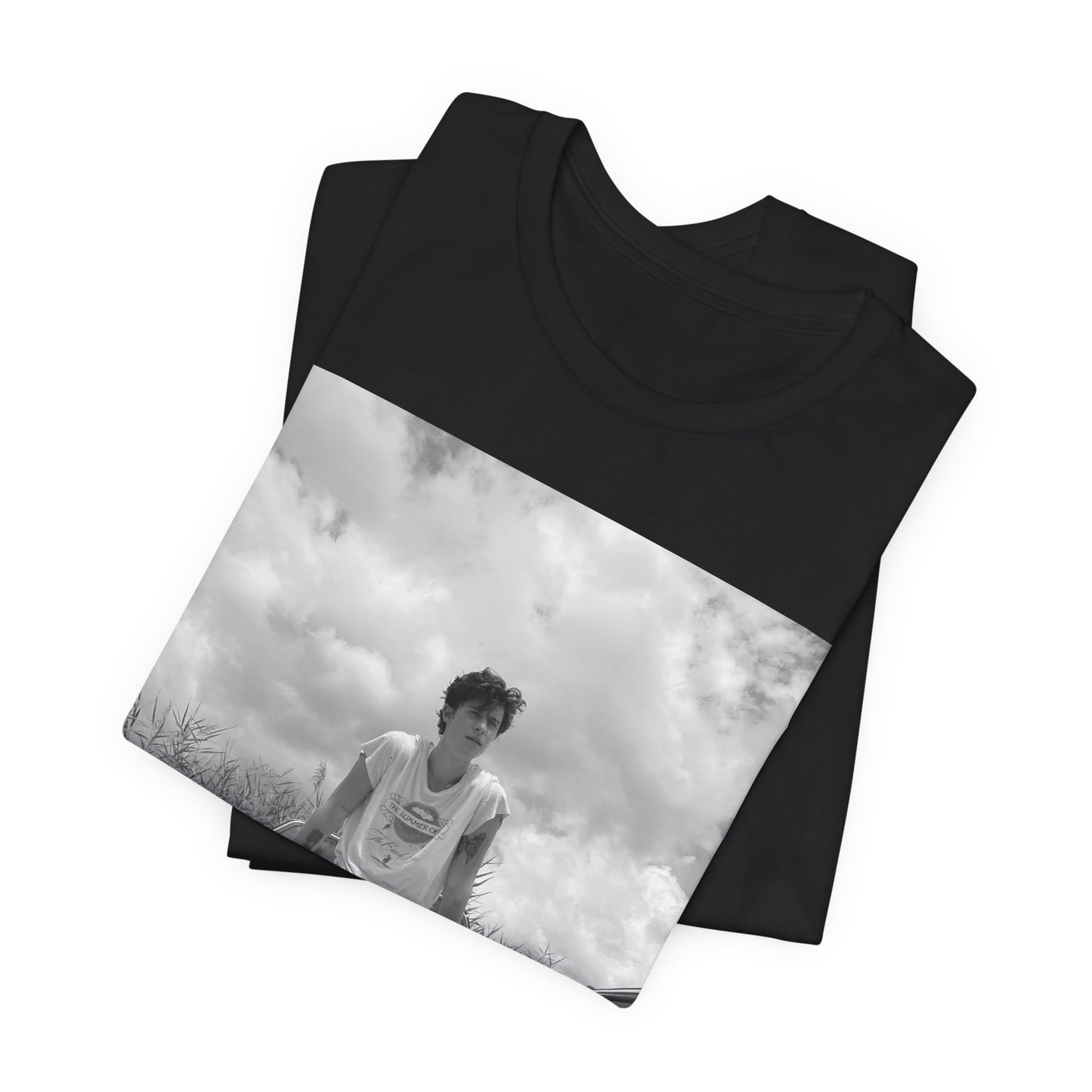 A black graphic t-shirt featuring a graphic of Shawn Mendes in an iconic tank top look.
