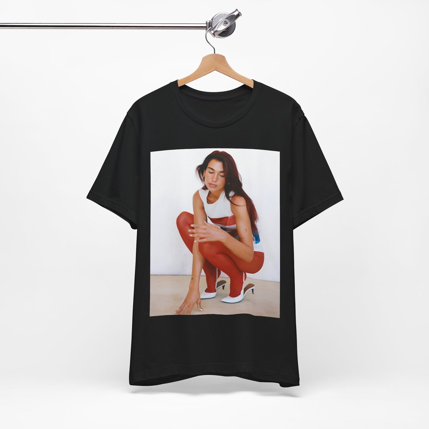 A black graphic t-shirt featuring a graphic of Dua Lipa with a chill pop vibe, designed for comfort.