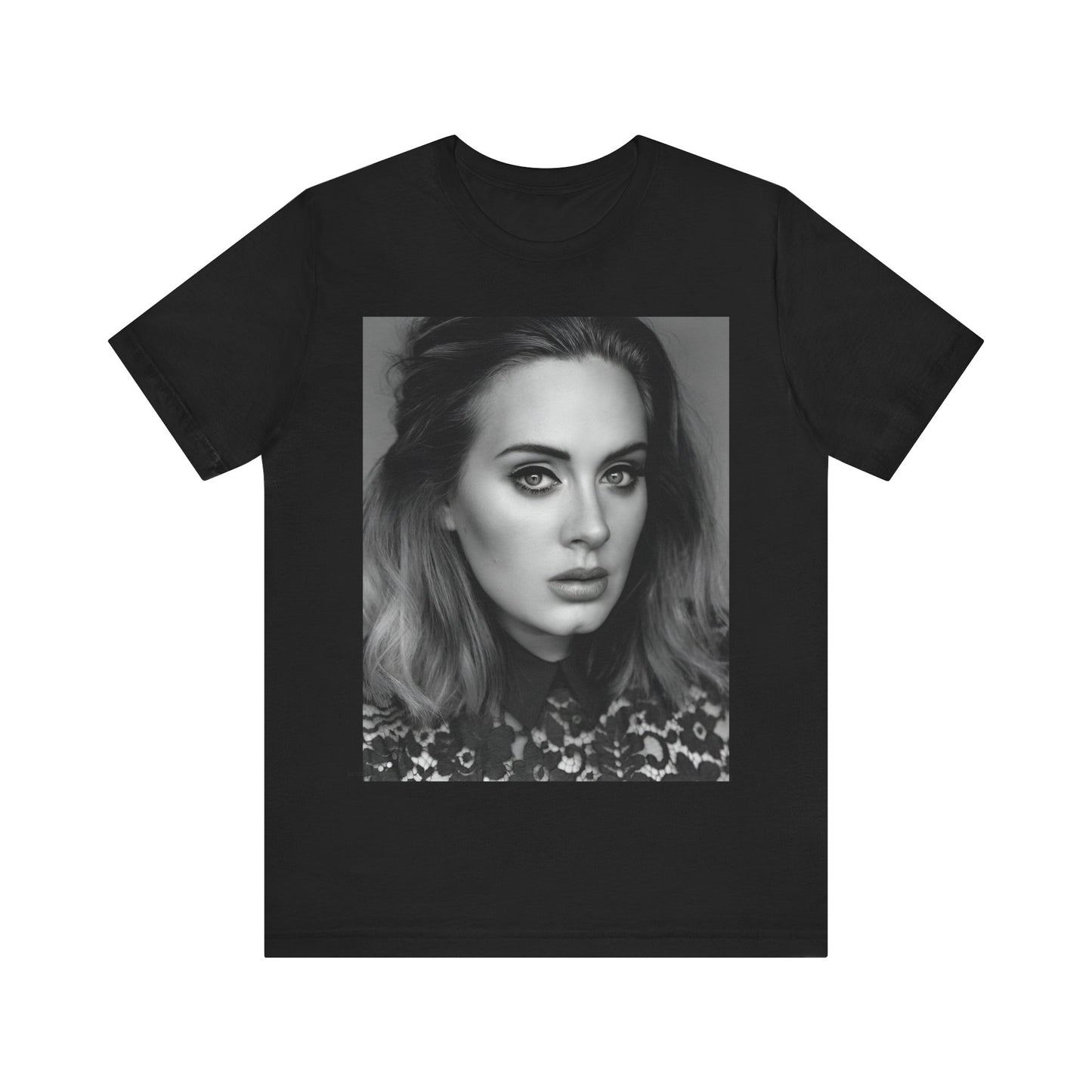 A black graphic t-shirt featuring a classic black and white, monochrome portrait of Adele, showing her with a serene or thoughtful expression.