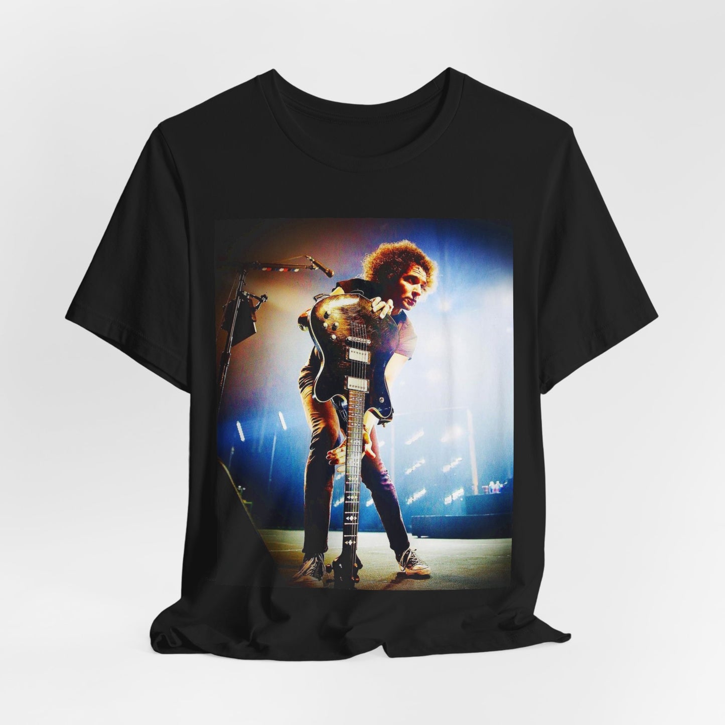 A black graphic t-shirt featuring a concert graphic for Alice In Chains' 2019 live show, with modern band imagery.