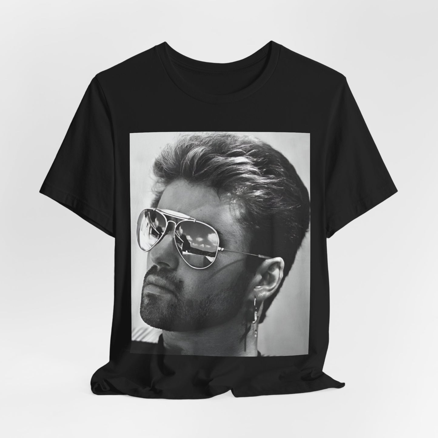 A black graphic t-shirt featuring a photo of George Michael wearing iconic sunglasses.