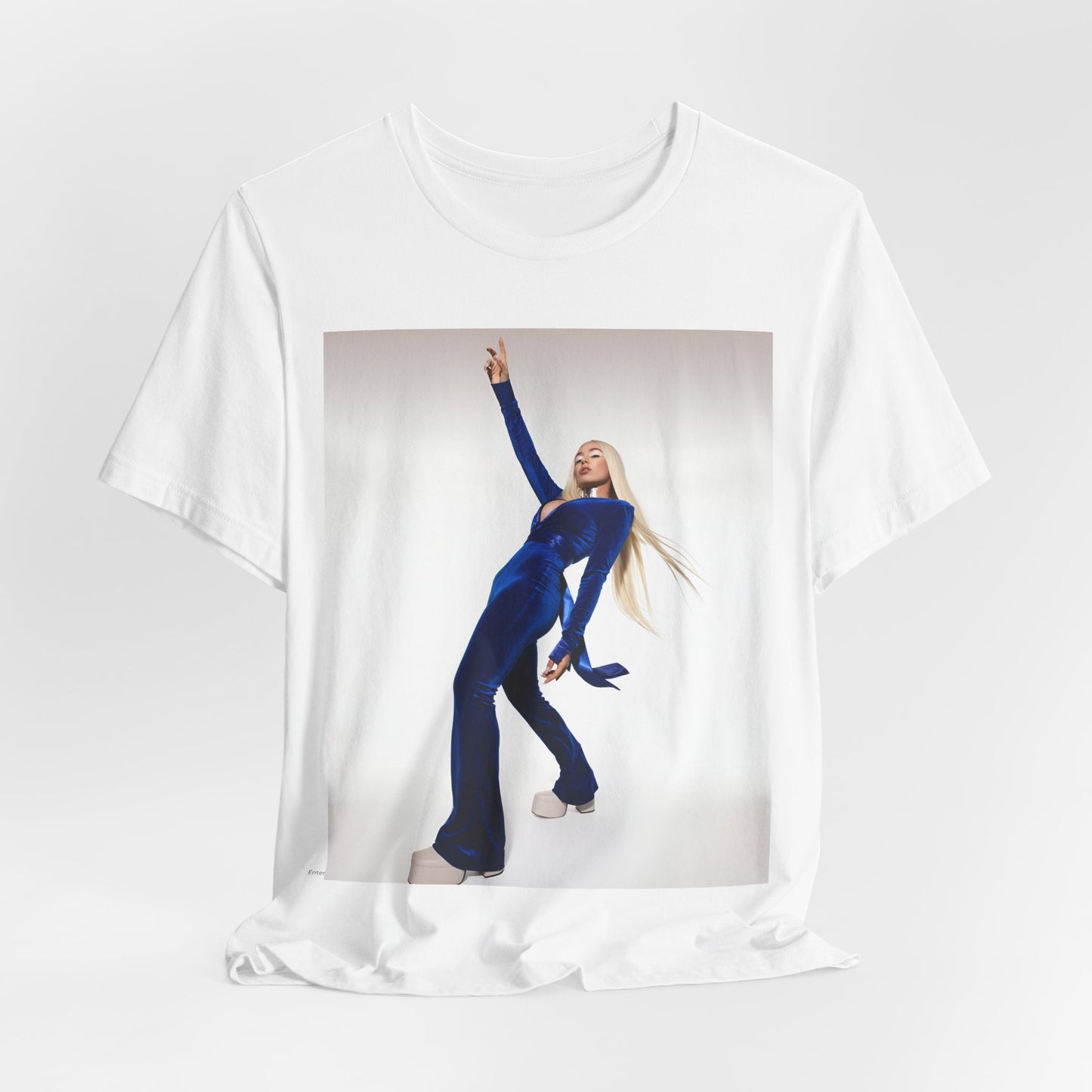 A black graphic t-shirt featuring Ava Max in a blue jumpsuit, in a graphic or photo style.