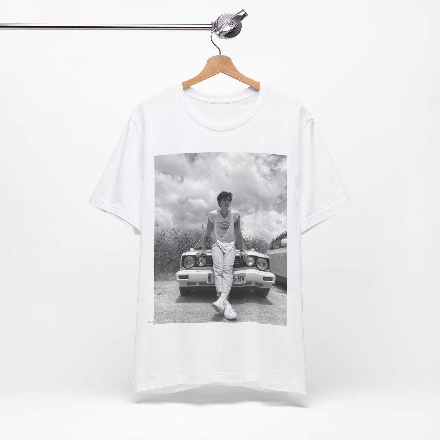 A black graphic t-shirt featuring a graphic of Shawn Mendes in an iconic tank top look.
