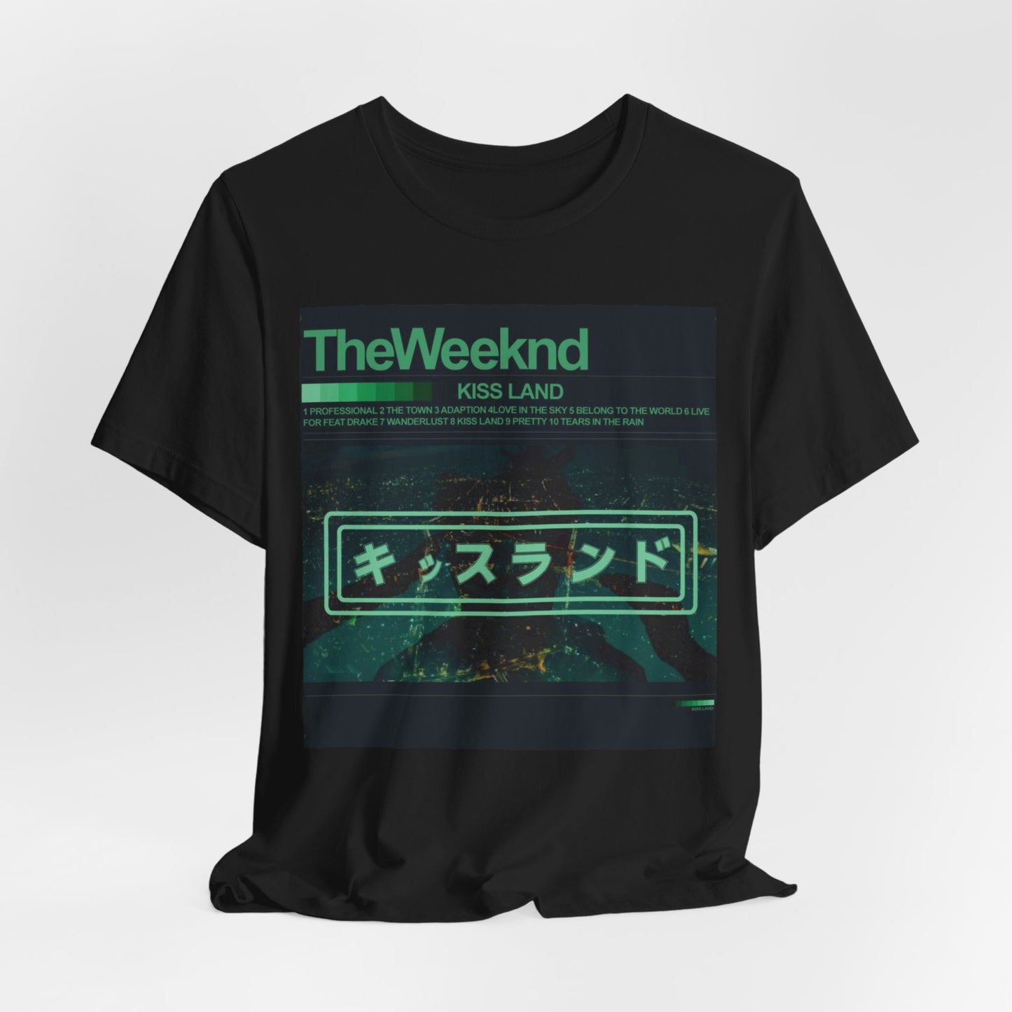 A black graphic t-shirt featuring a retro graphic related to The Weeknd's 'Kiss Land' album.