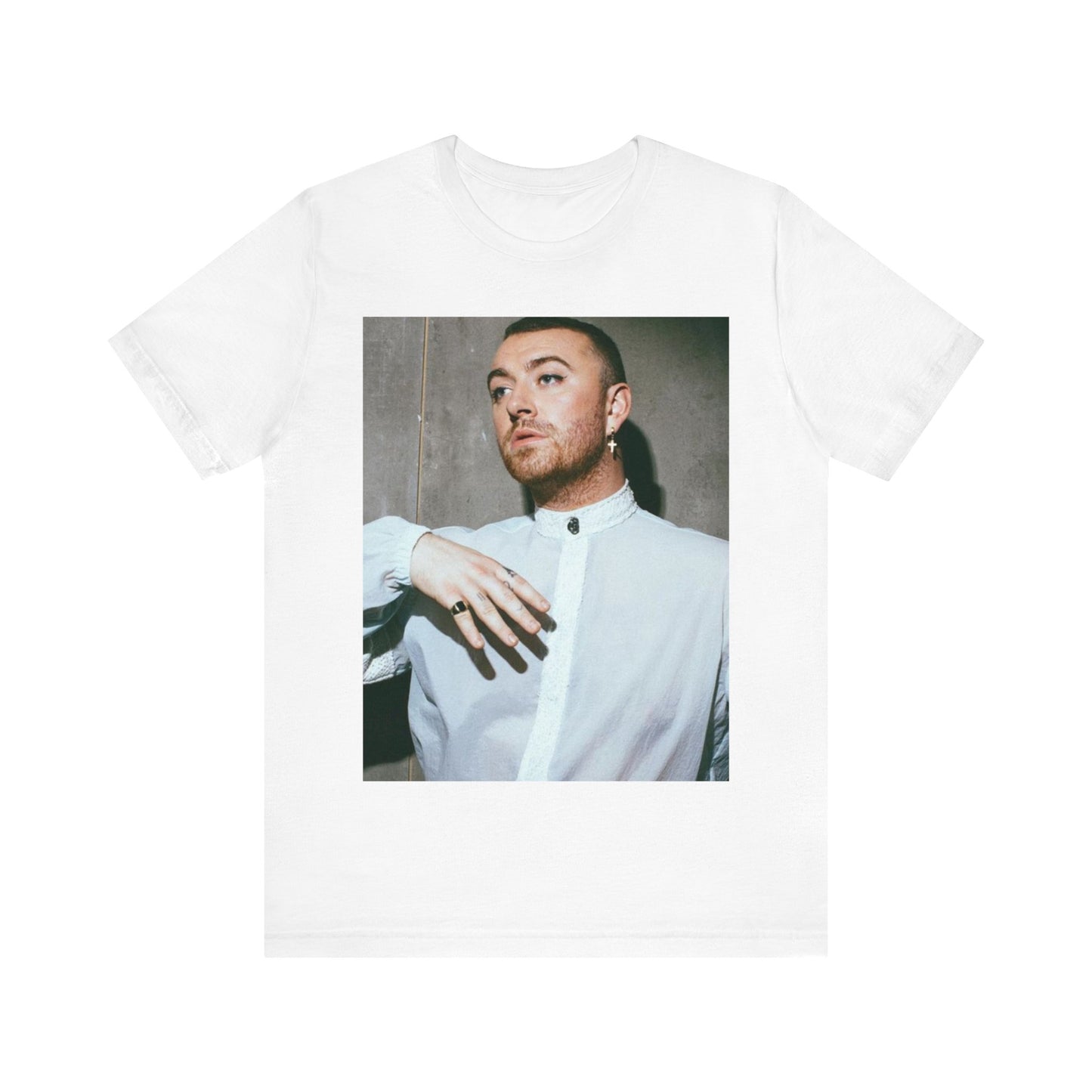 A black graphic t-shirt featuring a vintage graphic of Sam Smith emphasizing their soulful voice.