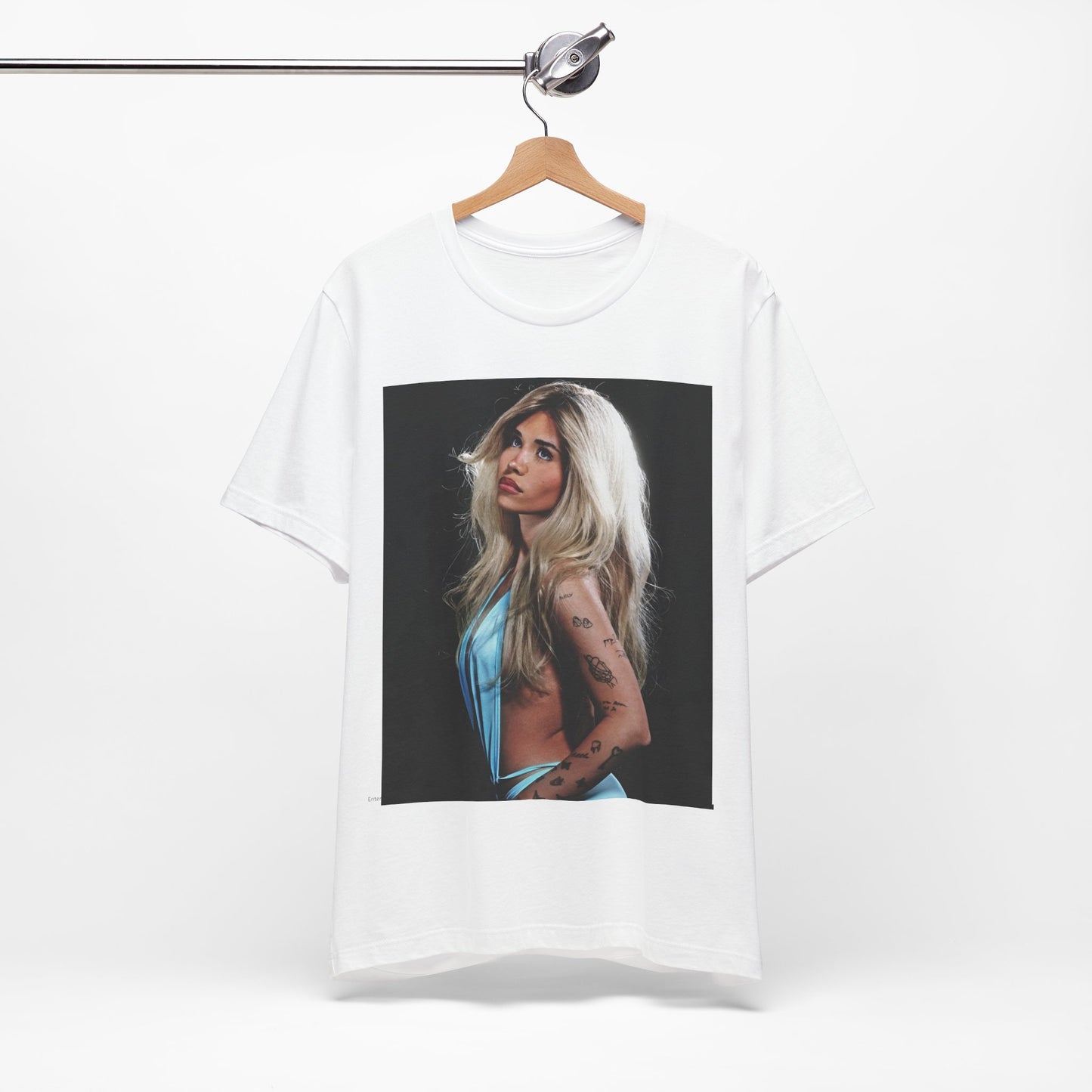 A black graphic t-shirt featuring a graphic related to Nessa Barrett's 'Pain' song or era.