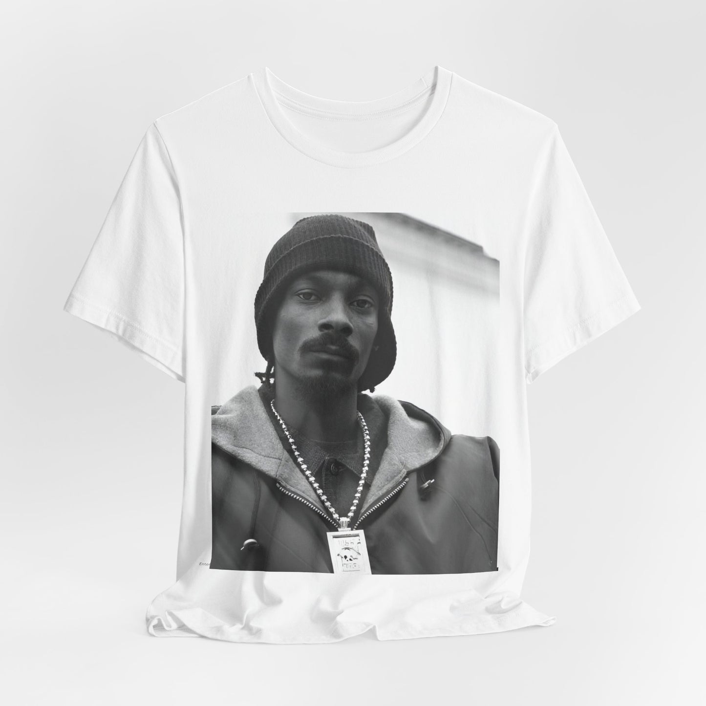 A black graphic t-shirt featuring a black and white, monochrome graphic of Snoop Dogg with an OG cool vibe.