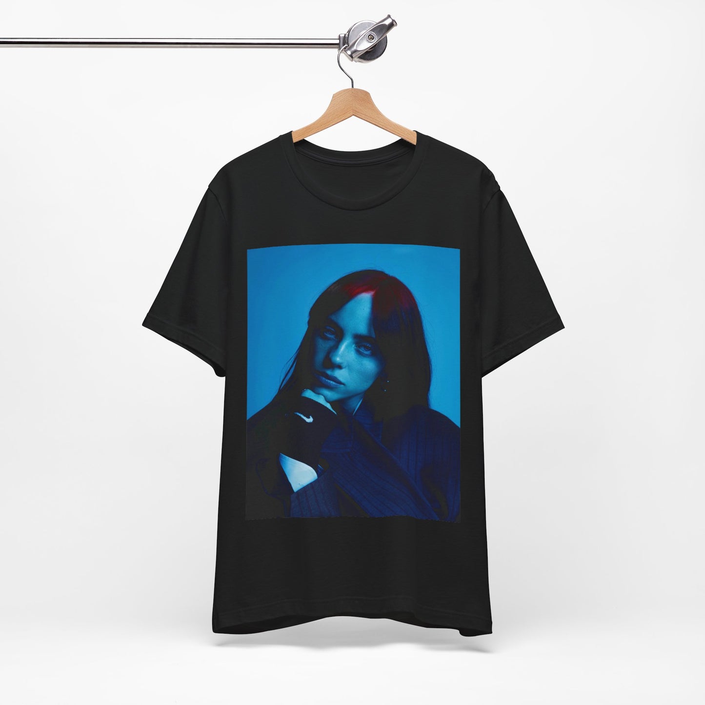 A soft, slightly blurred photo of Billie Eilish, evoking the dreamy and nostalgic feel of her song 'Ocean Eyes,' printed on a t-shirt.