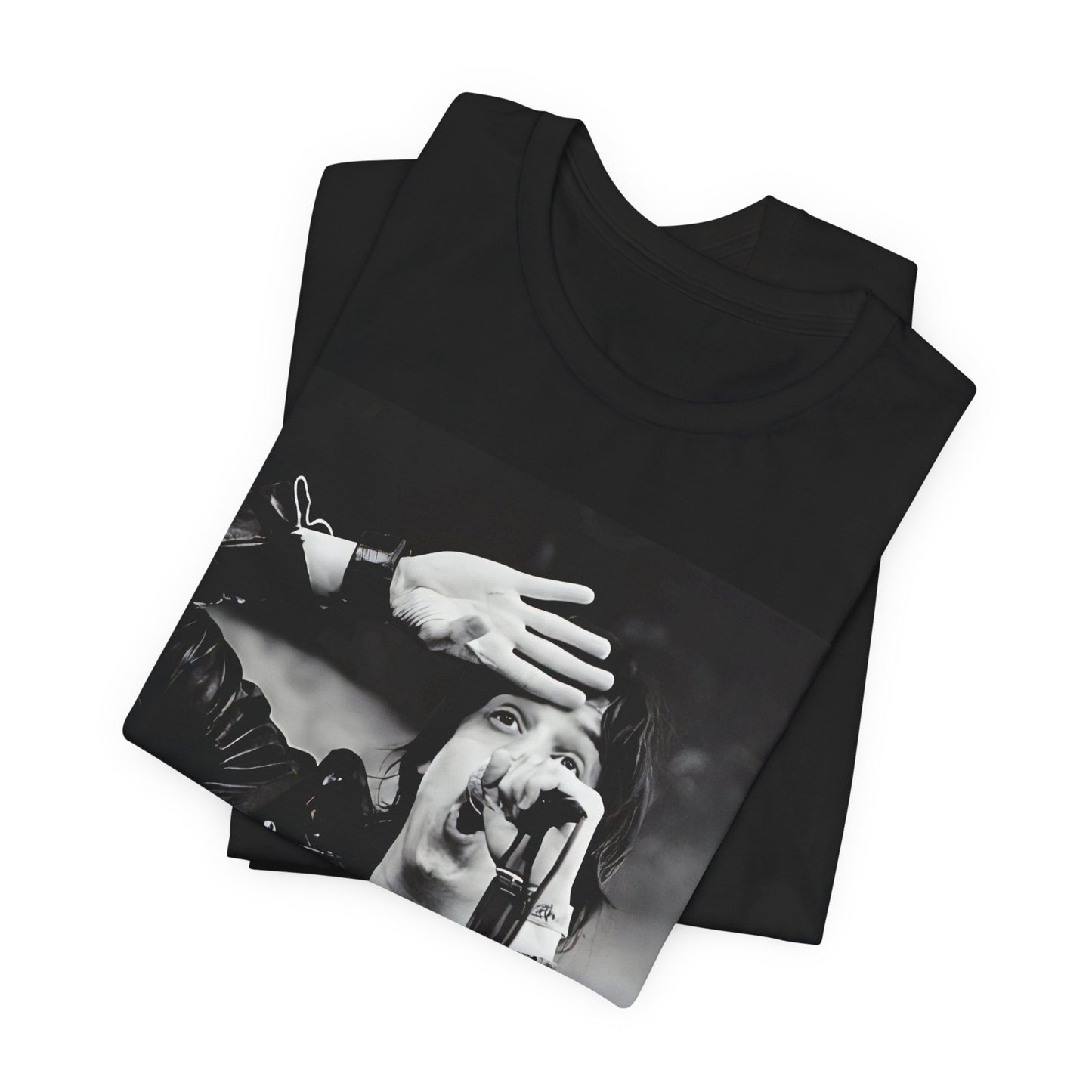 A black graphic t-shirt featuring a black and white portrait photo of The Strokes band.
