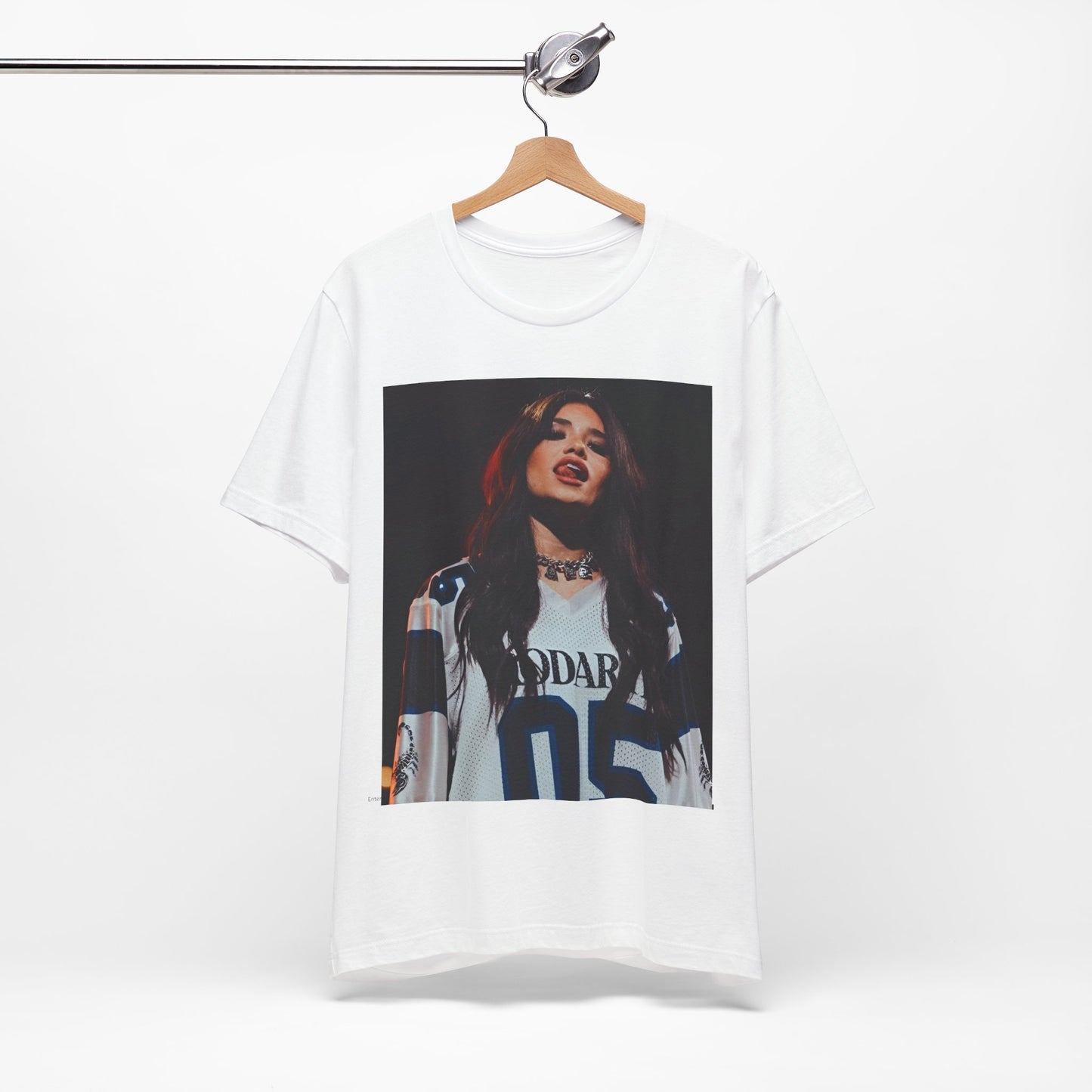 A black graphic t-shirt featuring a graphic or photo of Nessa Barrett performing live.