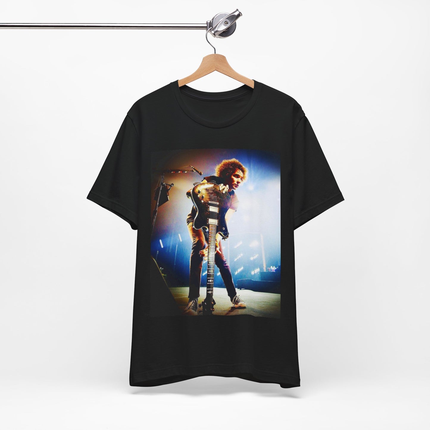 A black graphic t-shirt featuring a concert graphic for Alice In Chains' 2019 live show, with modern band imagery.