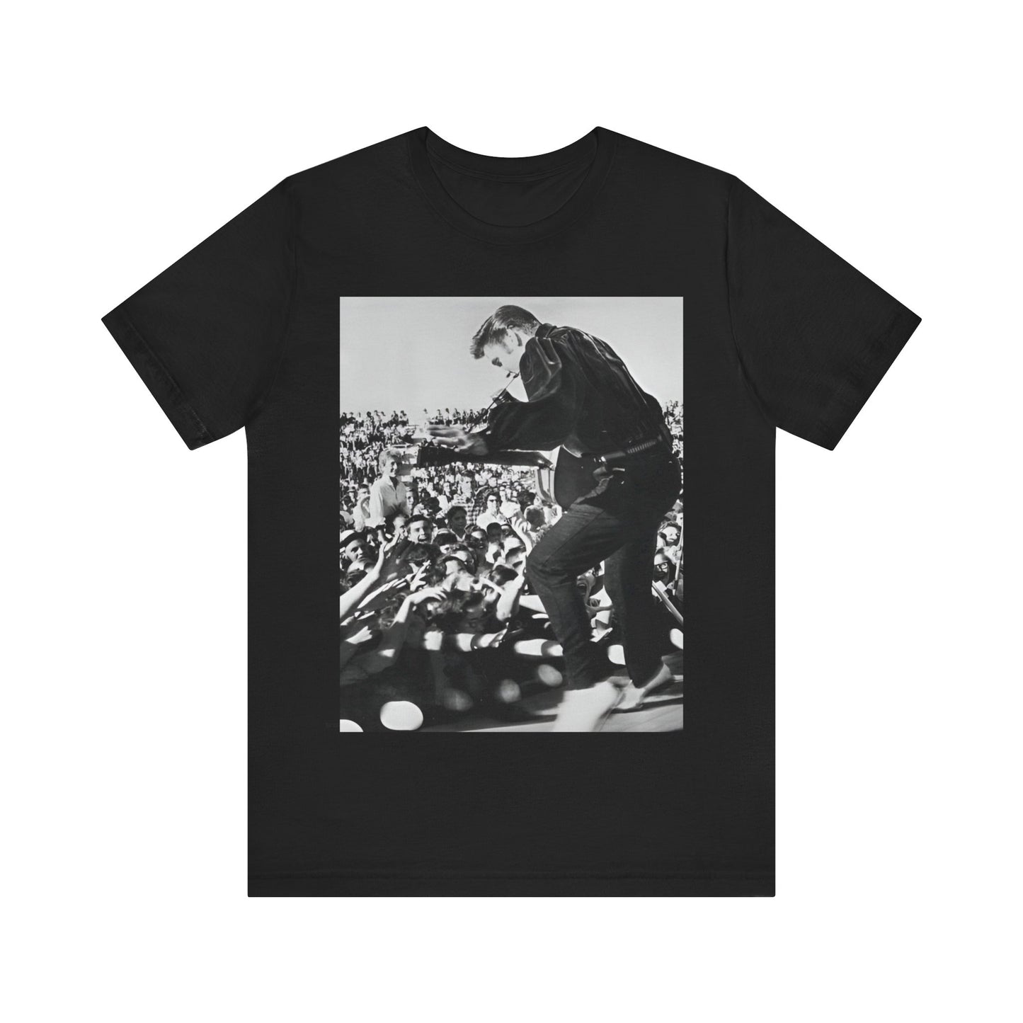 A black graphic t-shirt featuring a retro photo of Elvis Presley performing live in concert in the 1950s.