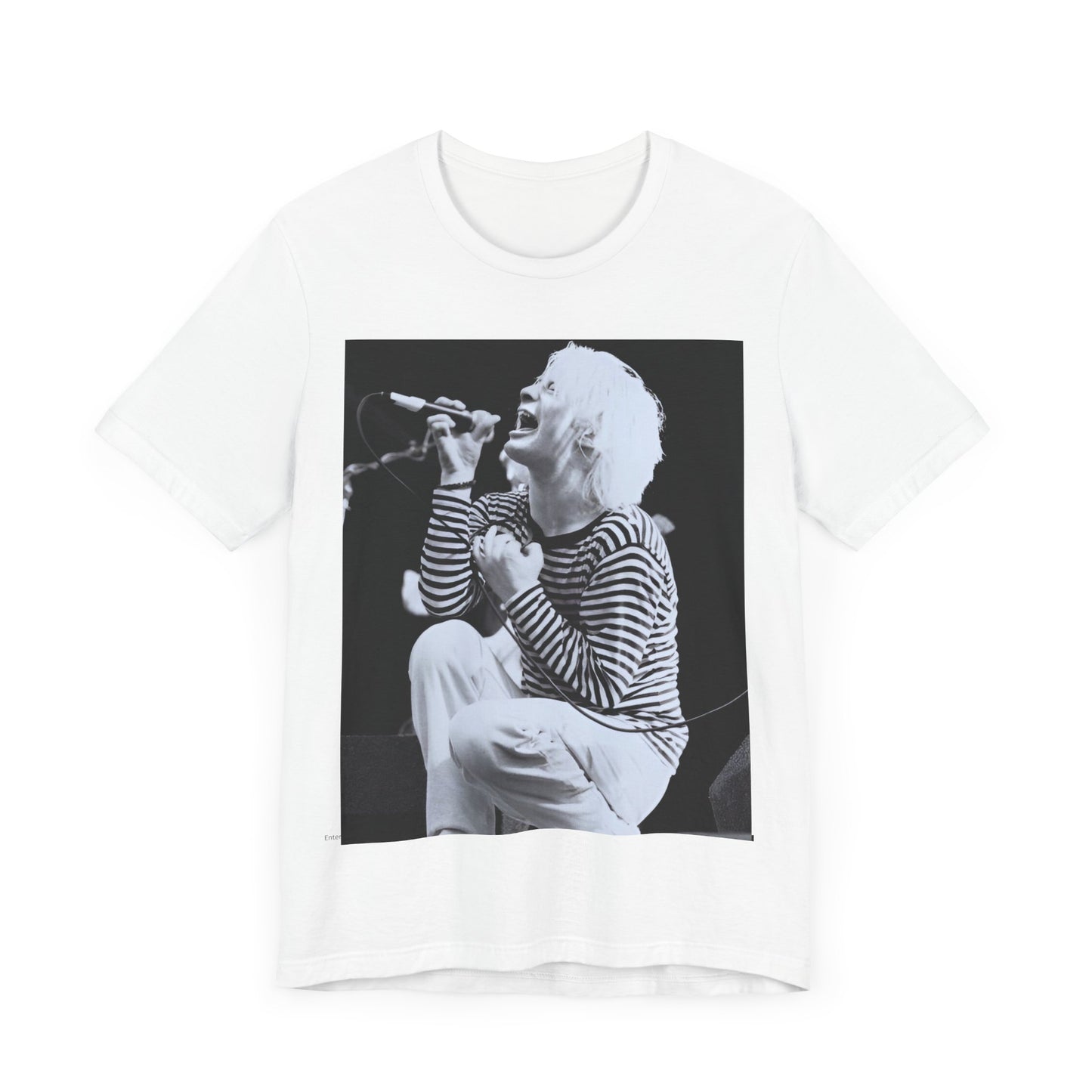A black graphic t-shirt featuring a black and white graphic or photo of Radiohead performing live.