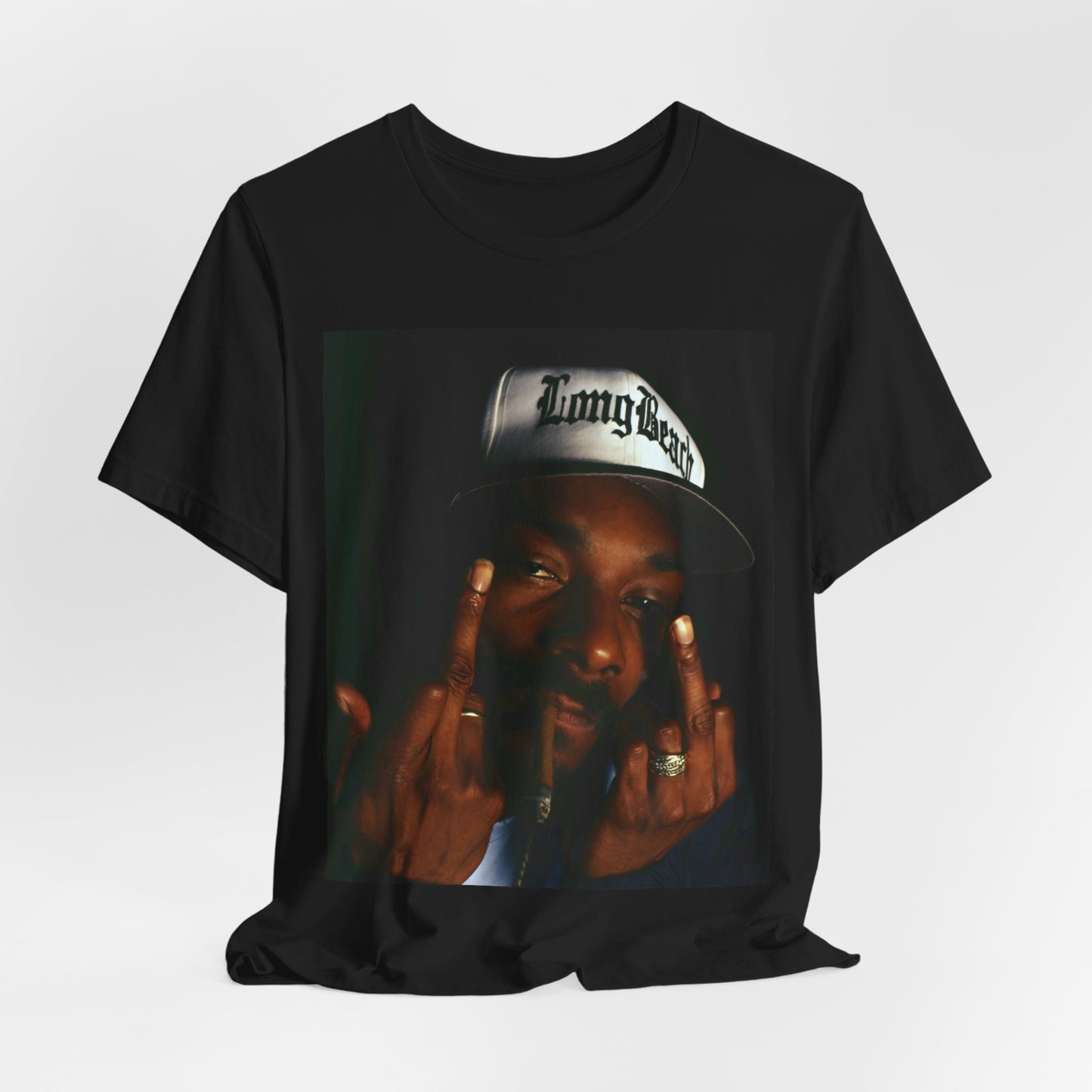A black graphic t-shirt featuring a graphic of Snoop Dogg giving the middle finger.