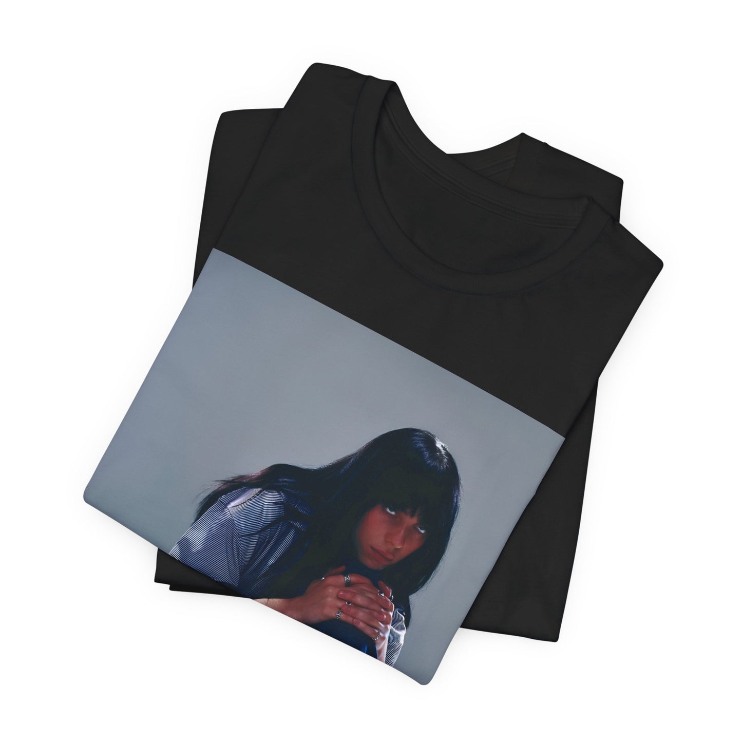 An artistic and slightly melancholic graphic t-shirt inspired by Billie Eilish's song "Lovely," featuring soft colors and a dreamy style.