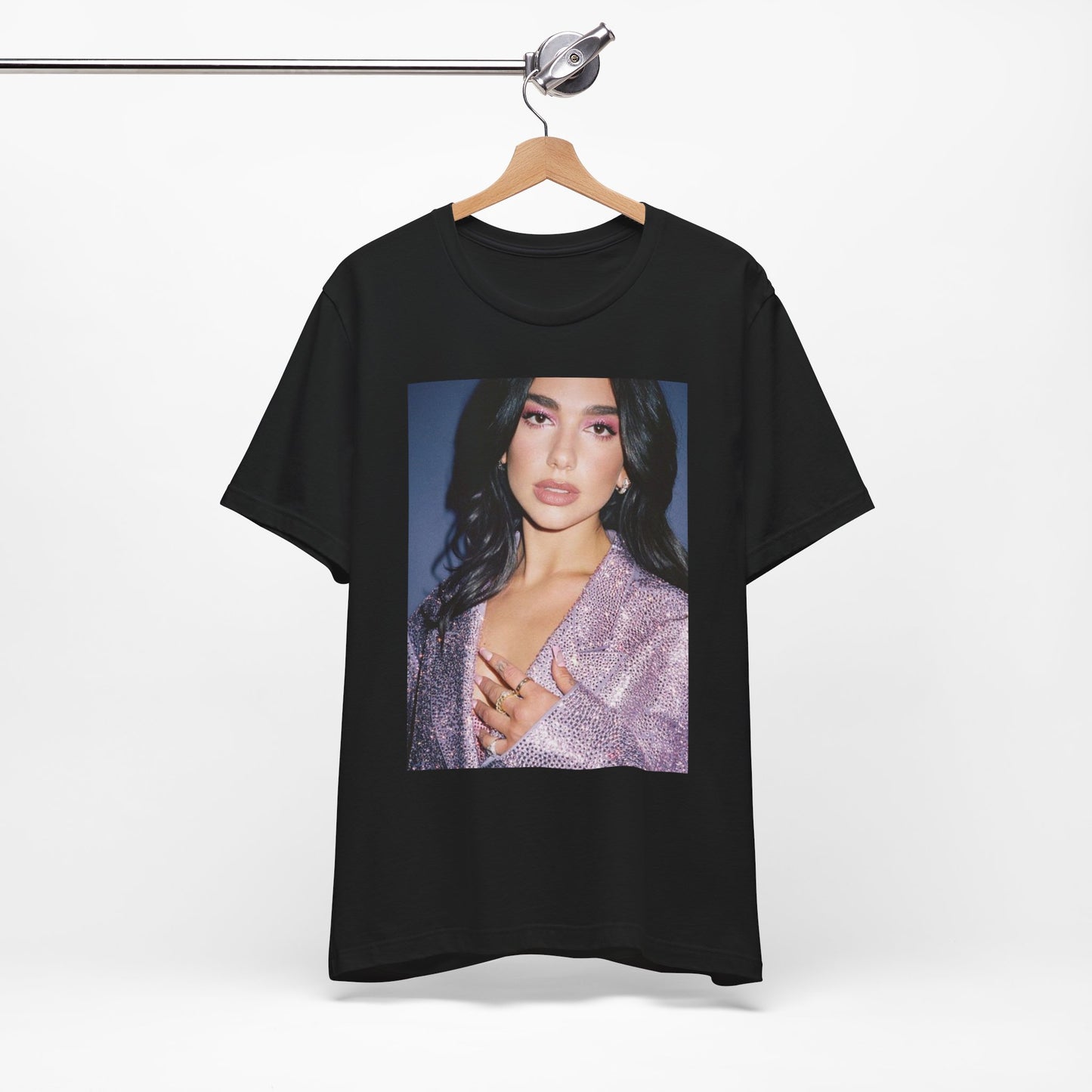 A black graphic t-shirt featuring a retro photo of Dua Lipa as a dance floor queen.