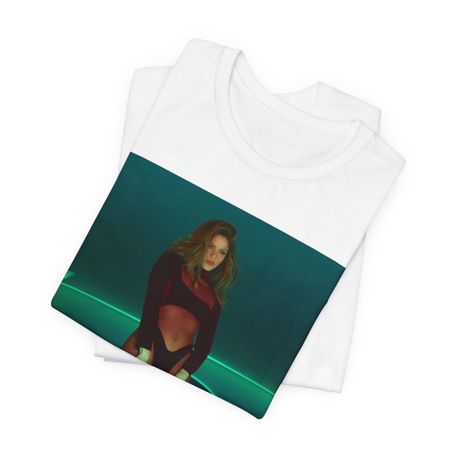 A black graphic t-shirt featuring a graphic of Shakira as the Queen of the Dance Floor.