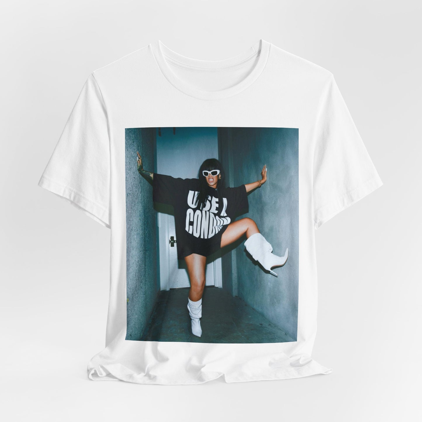 A black graphic t-shirt featuring a modern pop essential graphic of Rihanna.