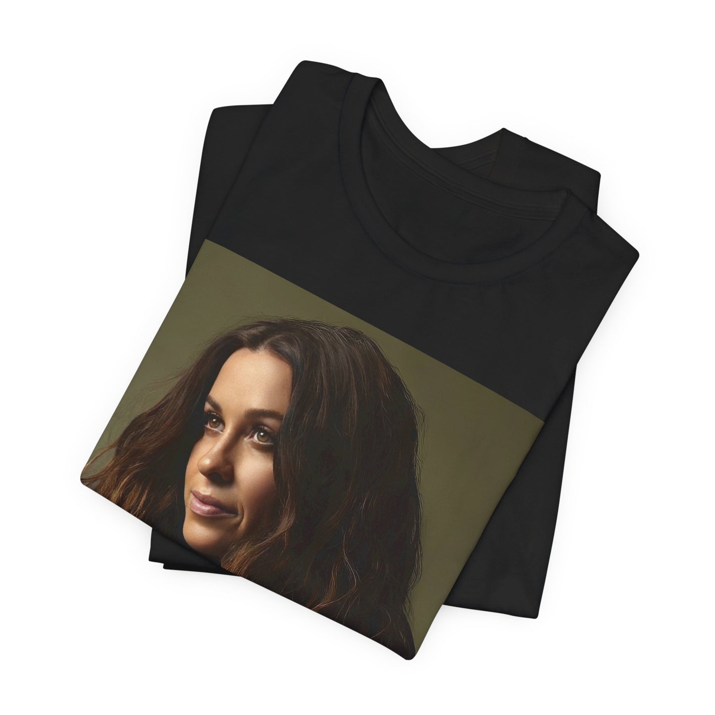 A black graphic t-shirt featuring a close-up portrait photo of Alanis Morissette, showing her intense or contemplative expression.