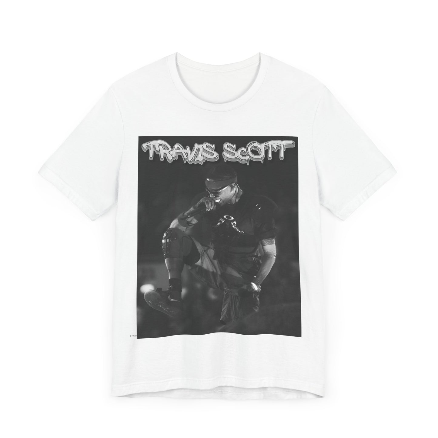 A black graphic t-shirt featuring a casual rap fan graphic of Travis Scott.