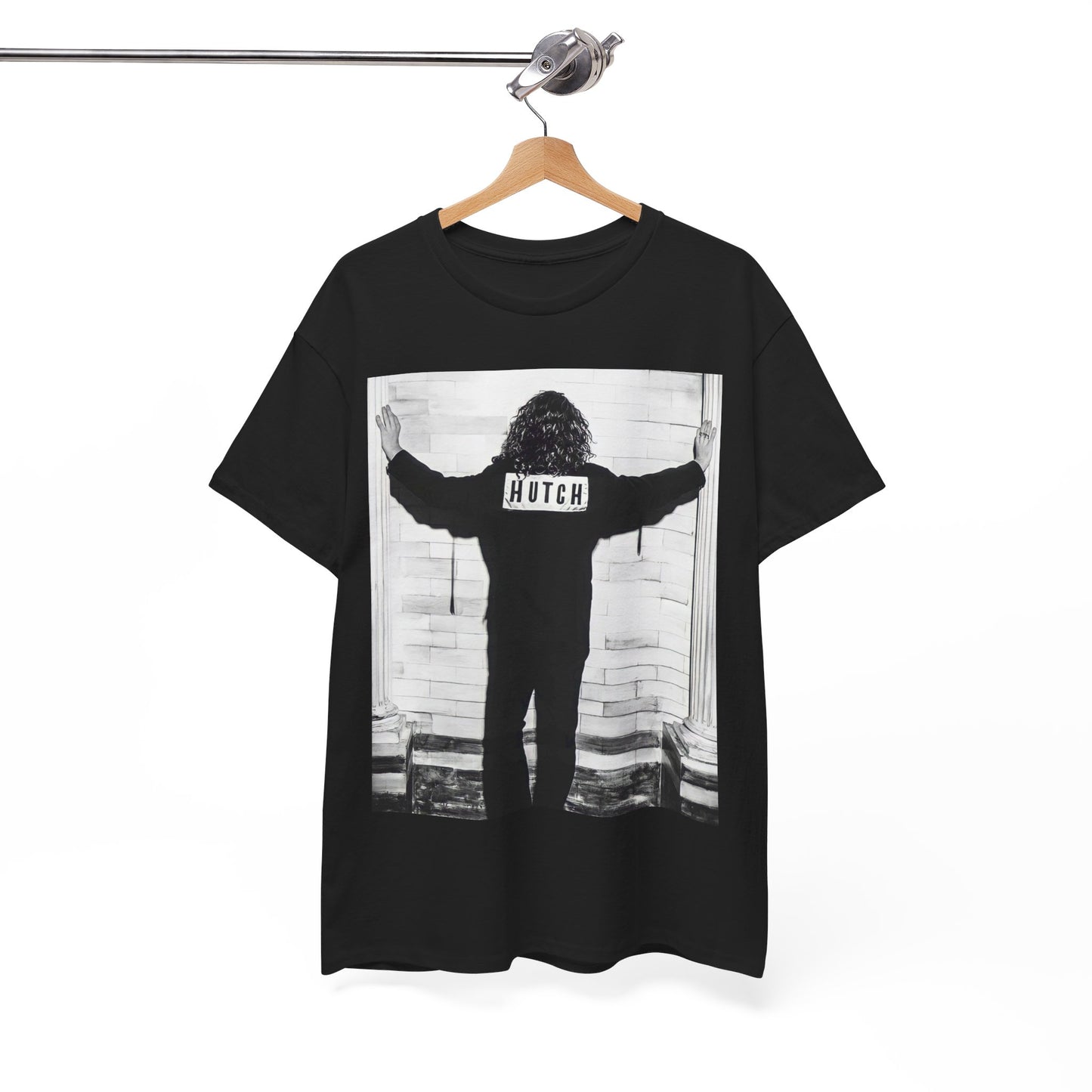 A black graphic t-shirt featuring a graphic of Michael Hutchence from INXS, labeled 'Hutch'.