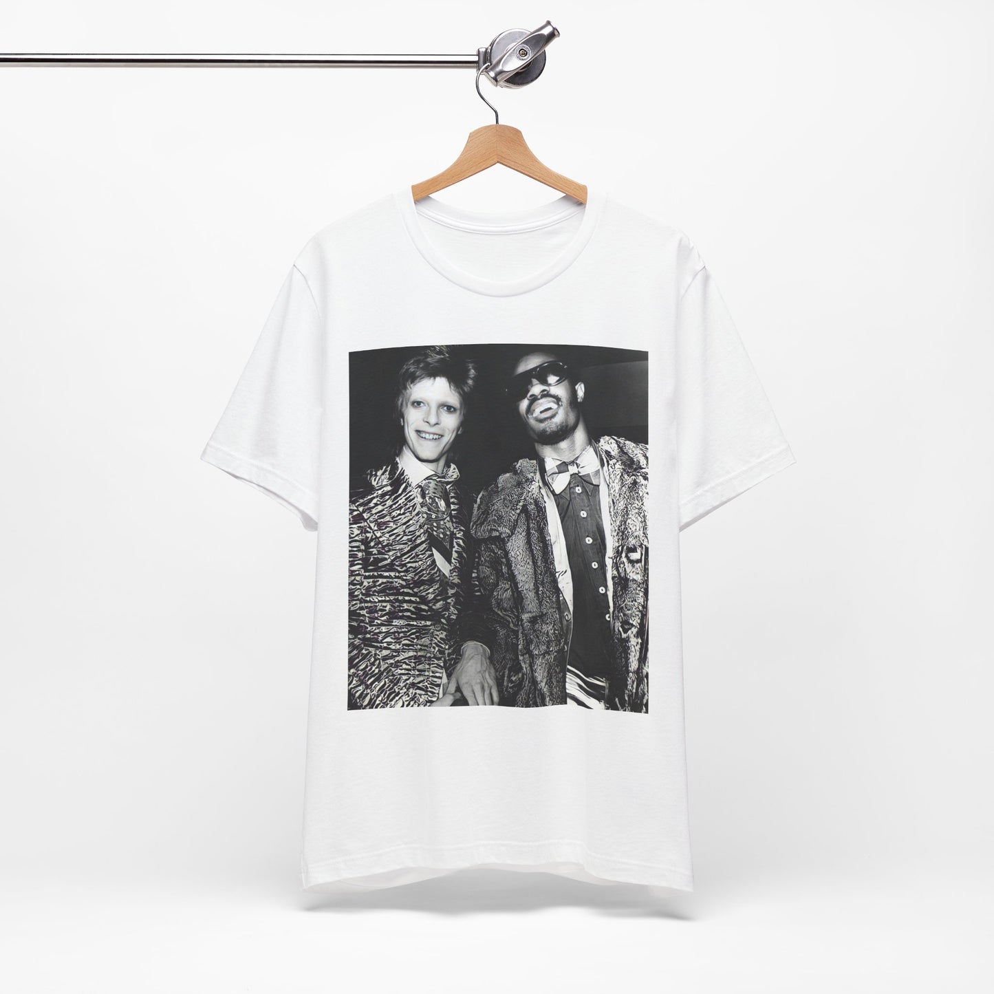 A black graphic t-shirt featuring a retro graphic of Stevie Wonder and David Bowie together.