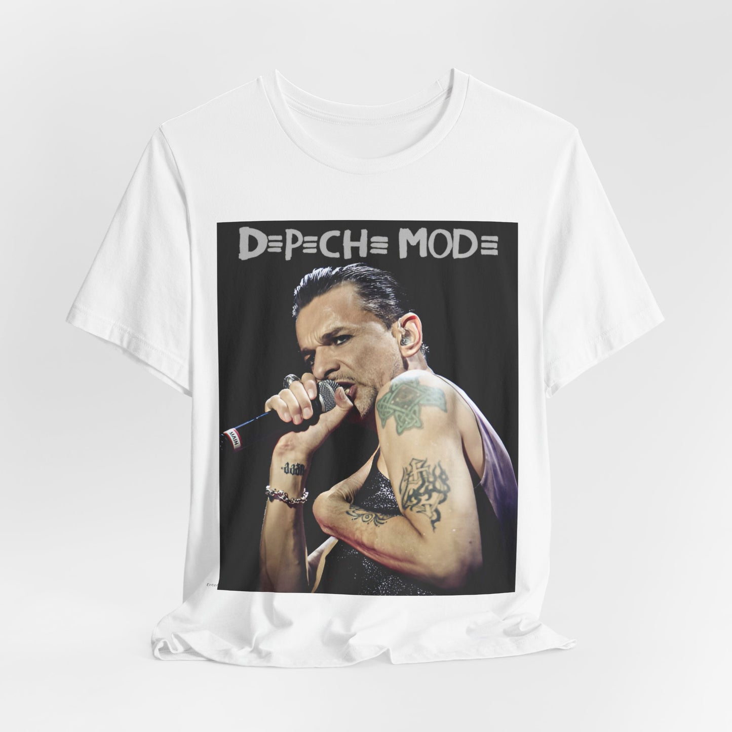 A black graphic t-shirt featuring a graphic of Dave Gahan from Depeche Mode, emphasizing his dynamic stage presence.