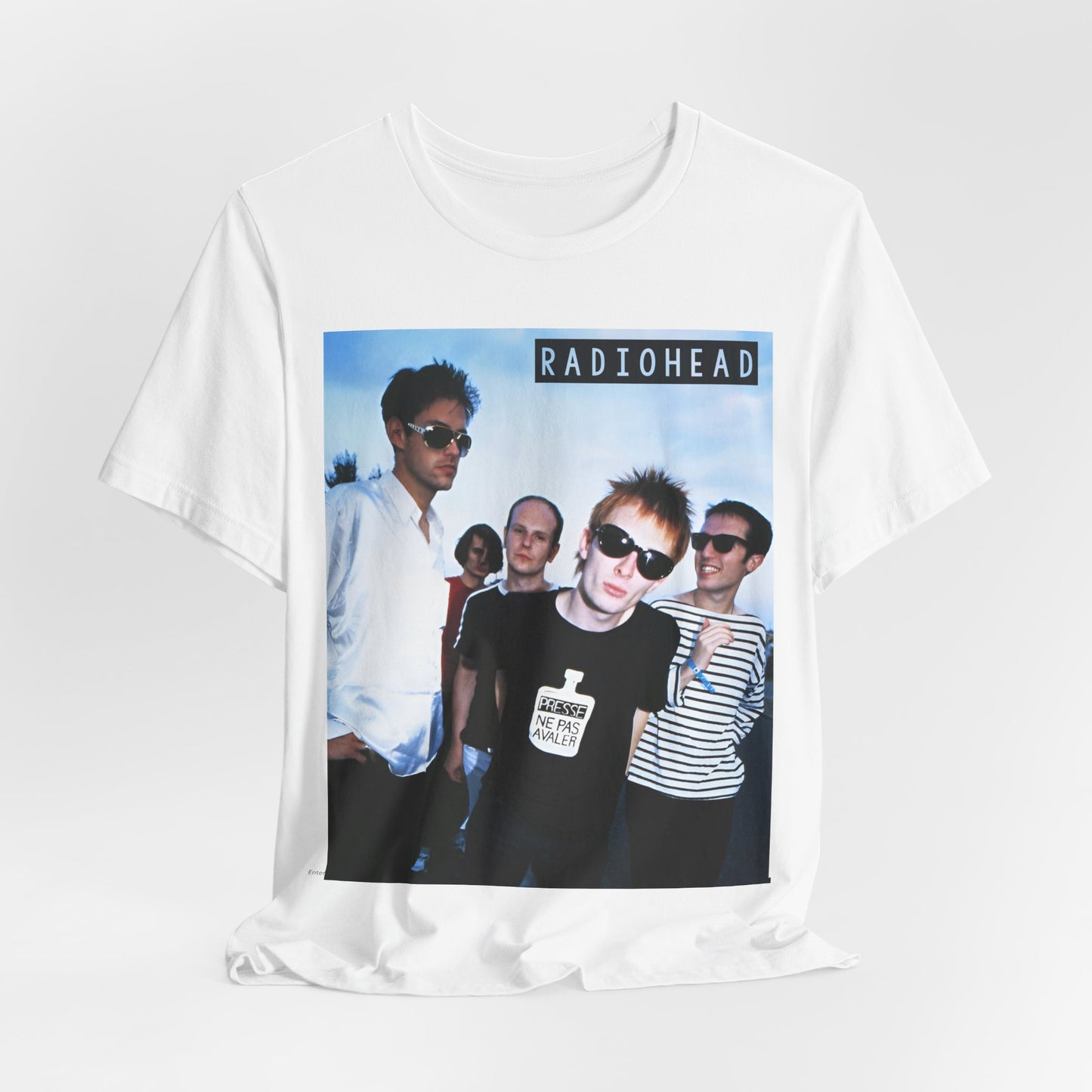 A black graphic t-shirt featuring a vintage alt rock graphic of Radiohead.
