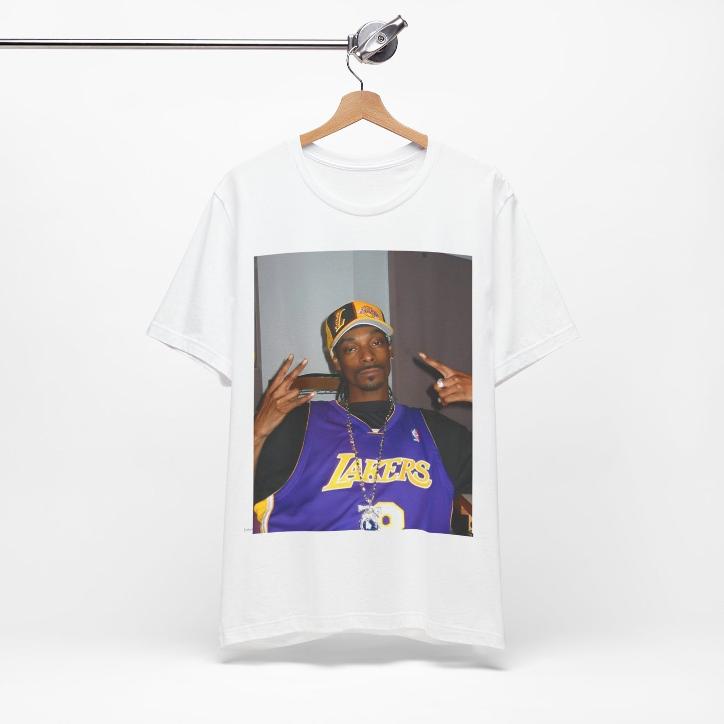 A black graphic t-shirt featuring a graphic of Snoop Dogg with Lakers branding or colors.