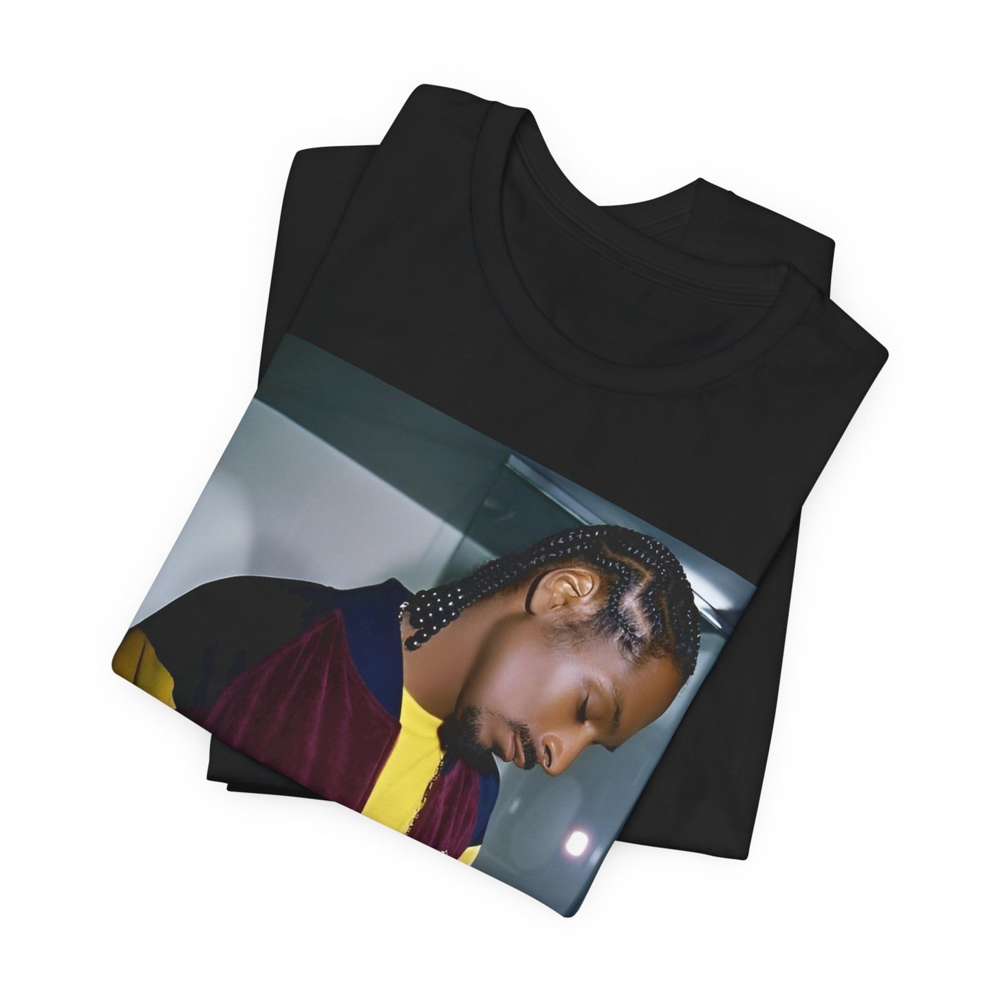 A black graphic t-shirt featuring a classic graphic of Snoop Dogg with a cool gaze.