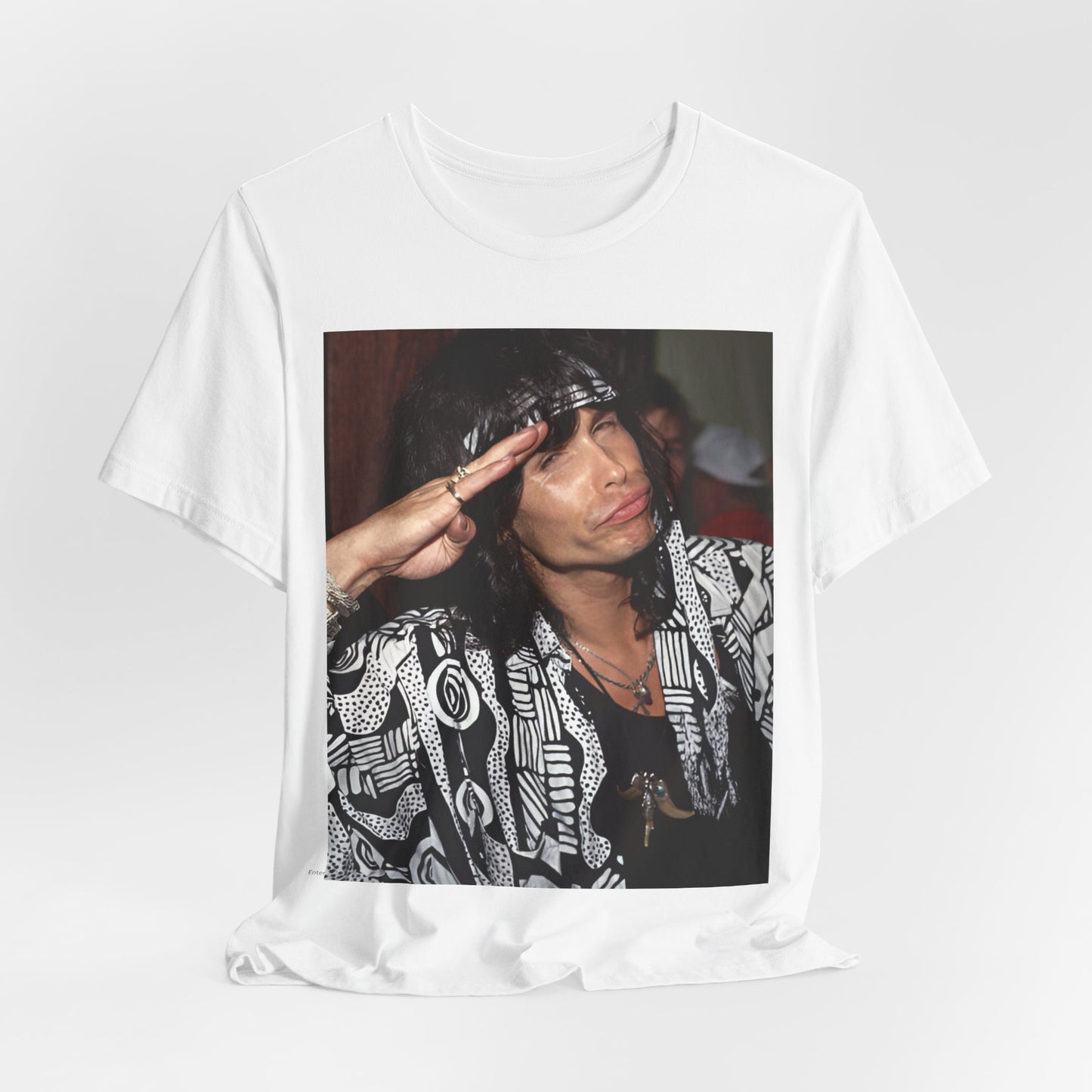 A black graphic t-shirt featuring a design related to Aerosmith's 'Get a Grip' tour, possibly incorporating album art elements or band visuals from that era.