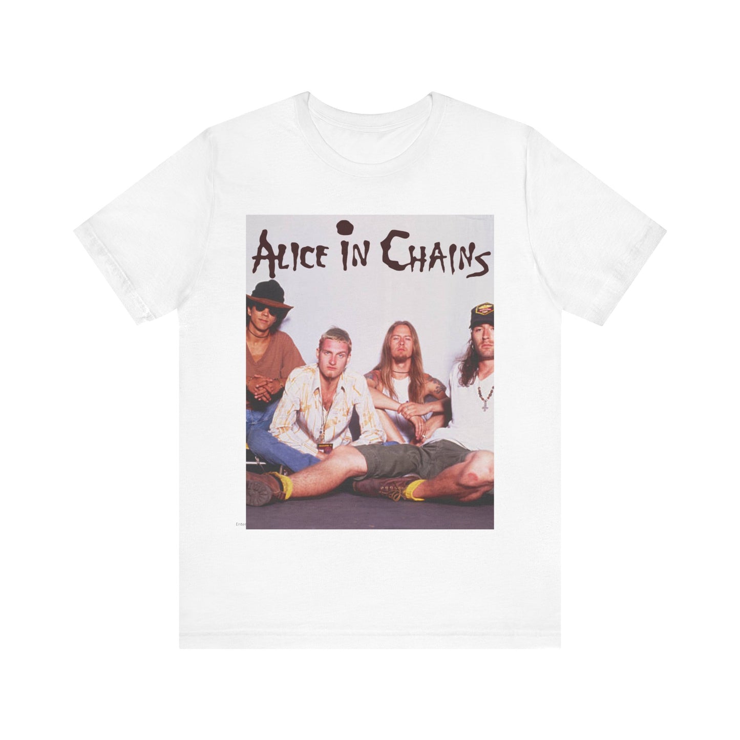 A black graphic t-shirt featuring a classic rock graphic of Alice In Chains from the 1990s, possibly with band members or stylized logo.
