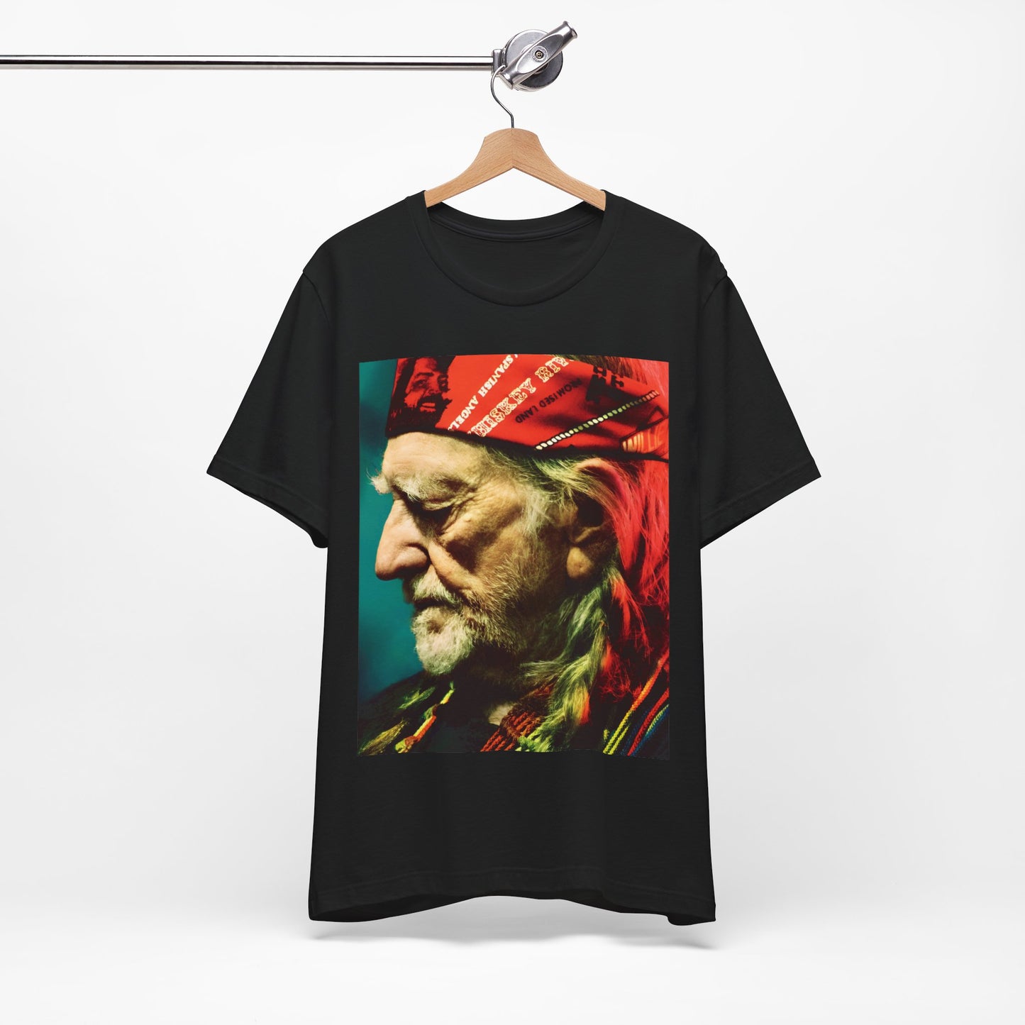 A black graphic t-shirt featuring a graphic related to Willie Nelson's 'Red Headed Stranger' album era.