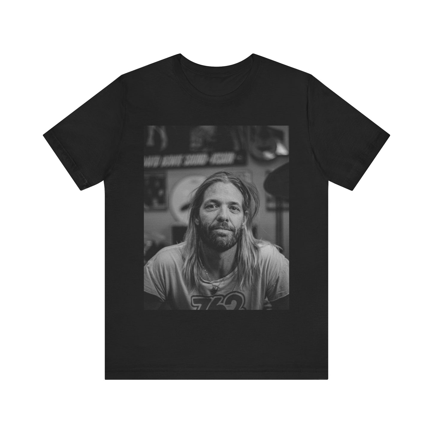 A black graphic t-shirt featuring a tribute graphic for Taylor Hawkins of Foo Fighters.