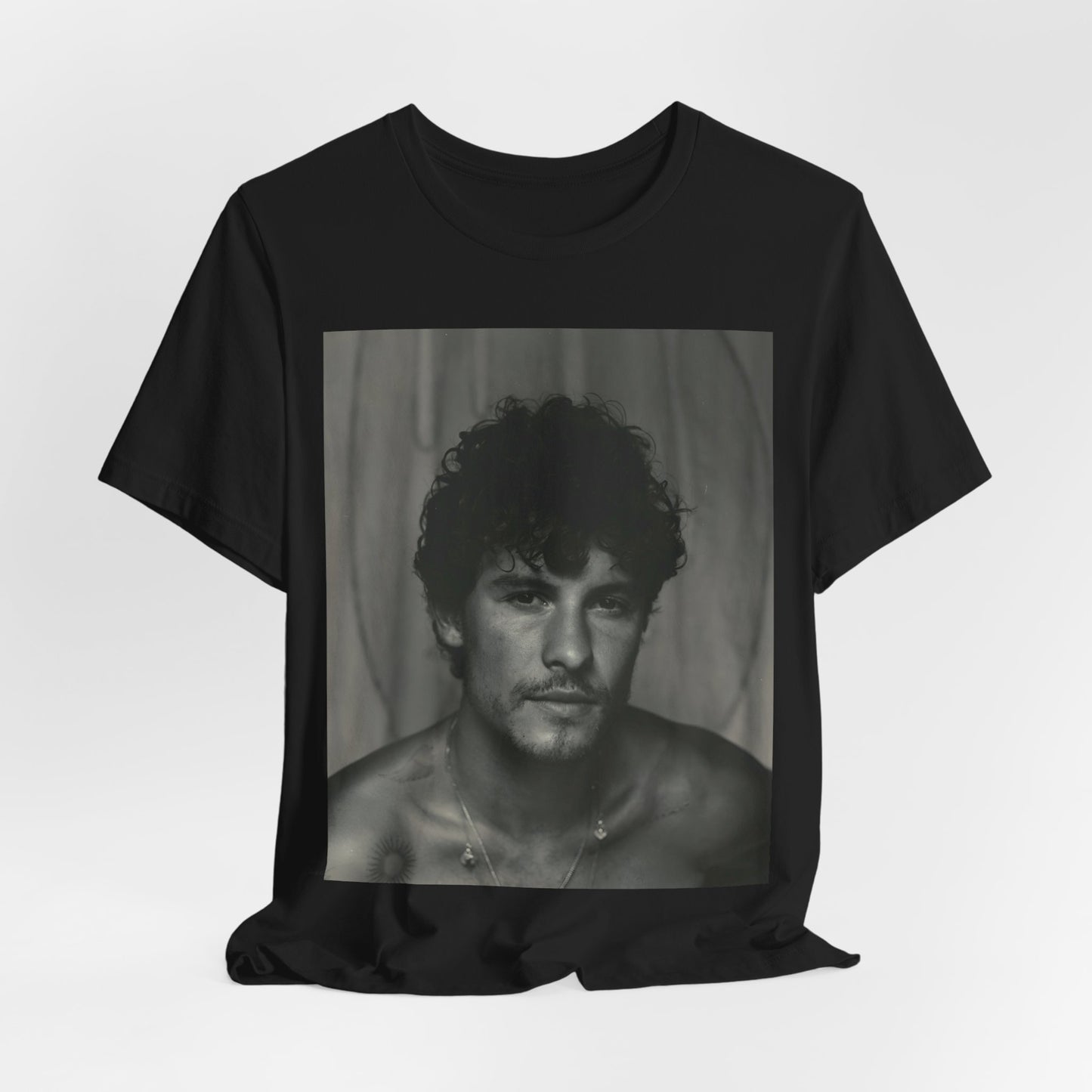 A black graphic t-shirt featuring a fearless portrait graphic of Shawn Mendes.