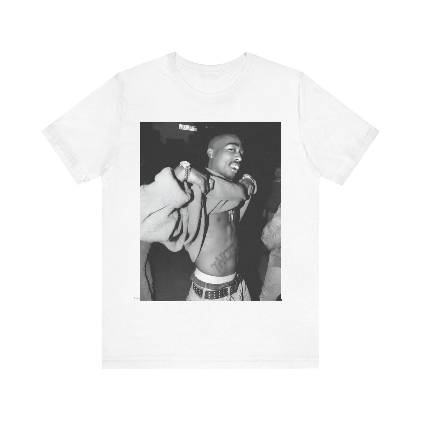 A black graphic t-shirt featuring a vintage hip hop icon graphic of Tupac.