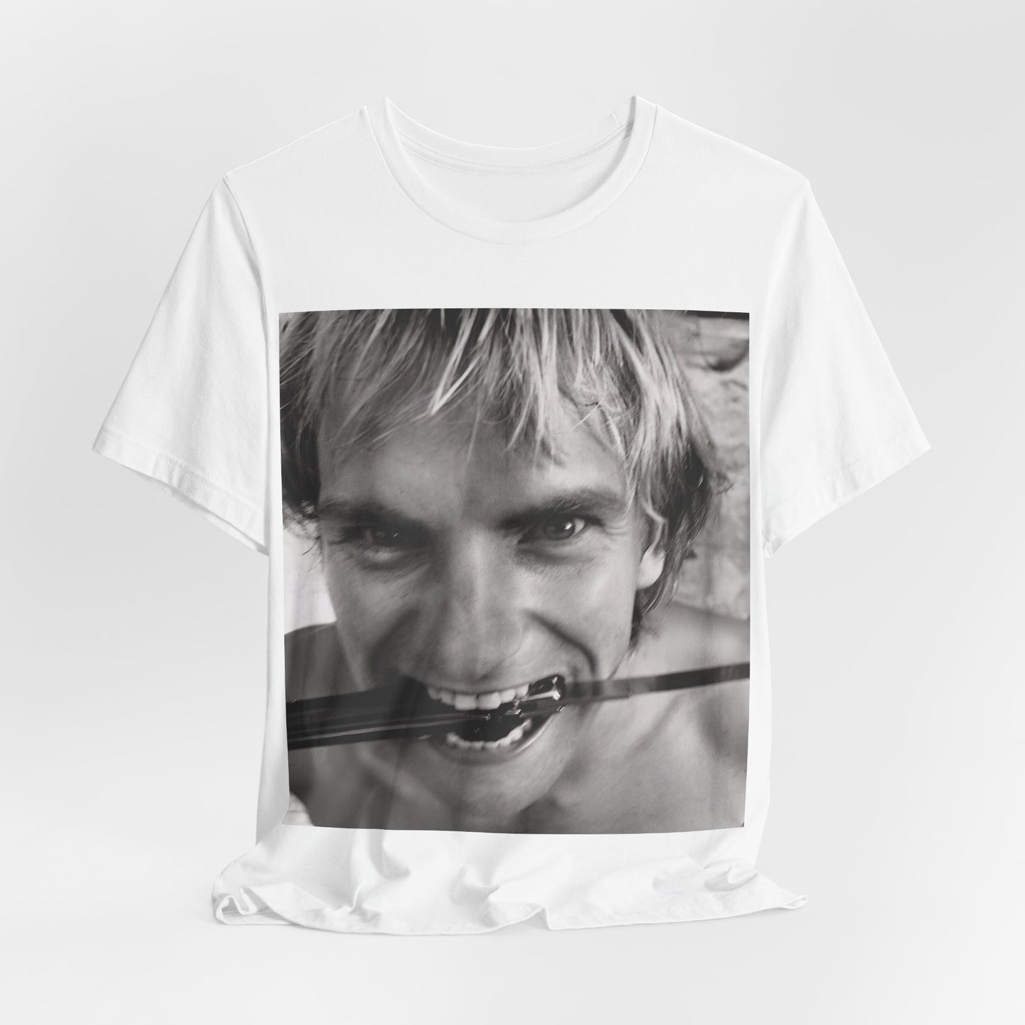 A black graphic t-shirt featuring a wild photo graphic of Sting.