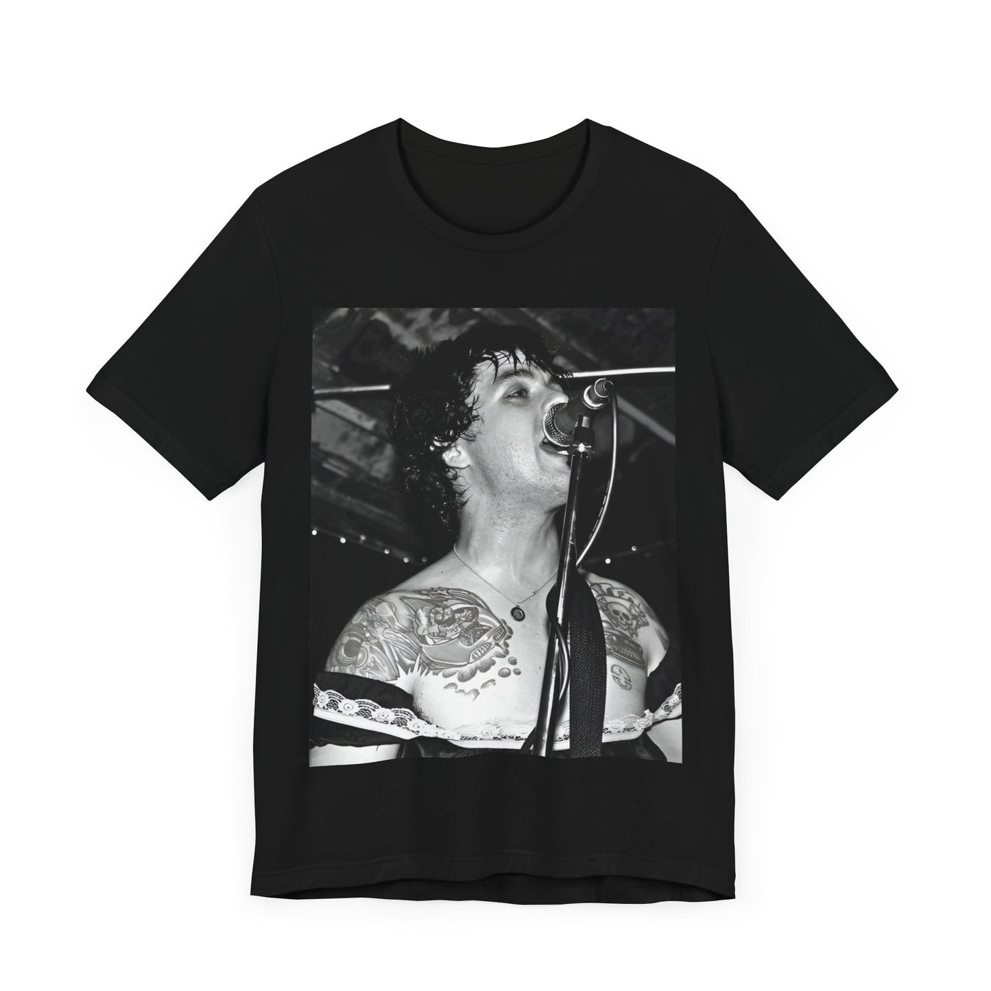 A black graphic t-shirt featuring a black and white graphic or photo of Green Day performing live on stage.