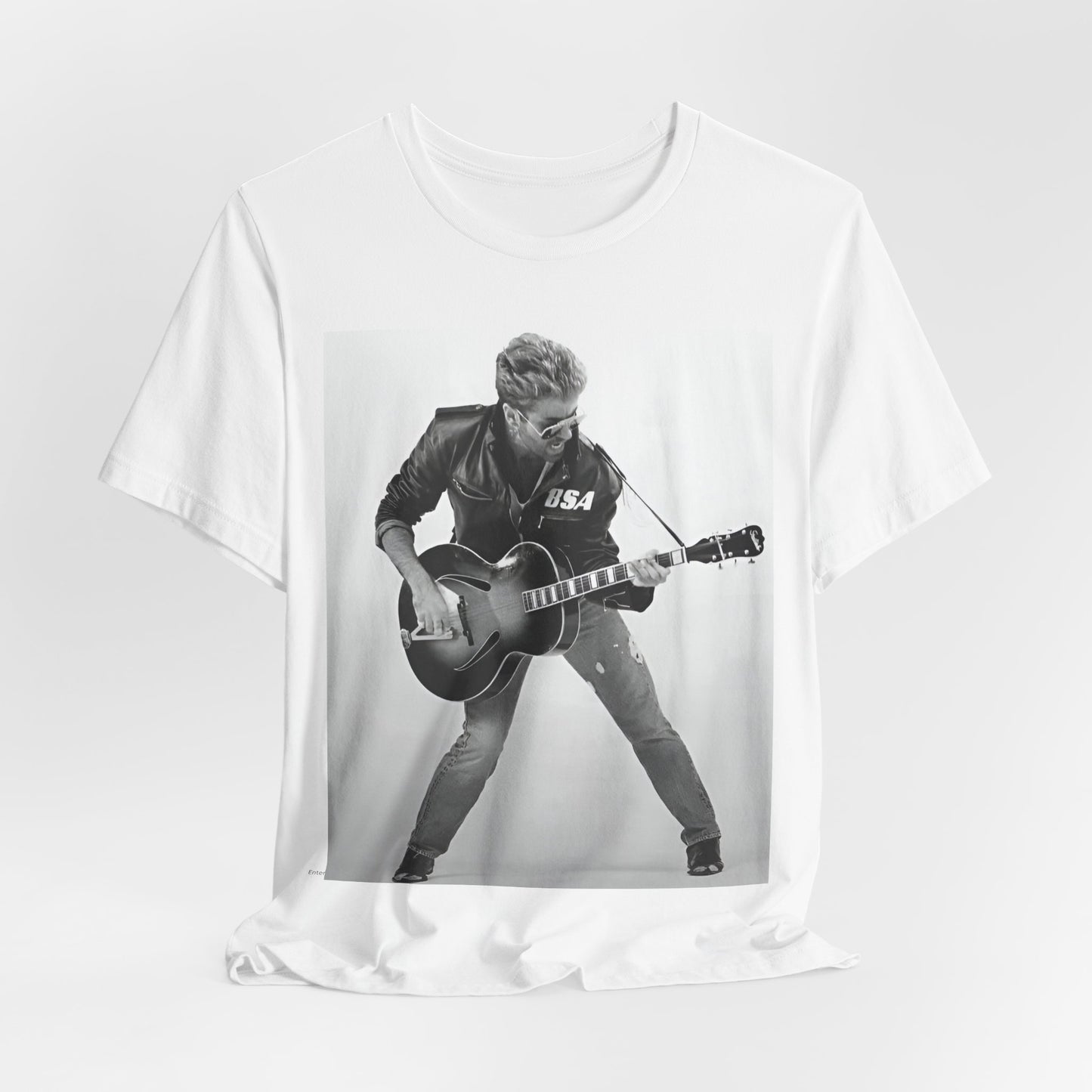 A black graphic t-shirt featuring a graphic of George Michael with a guitar.