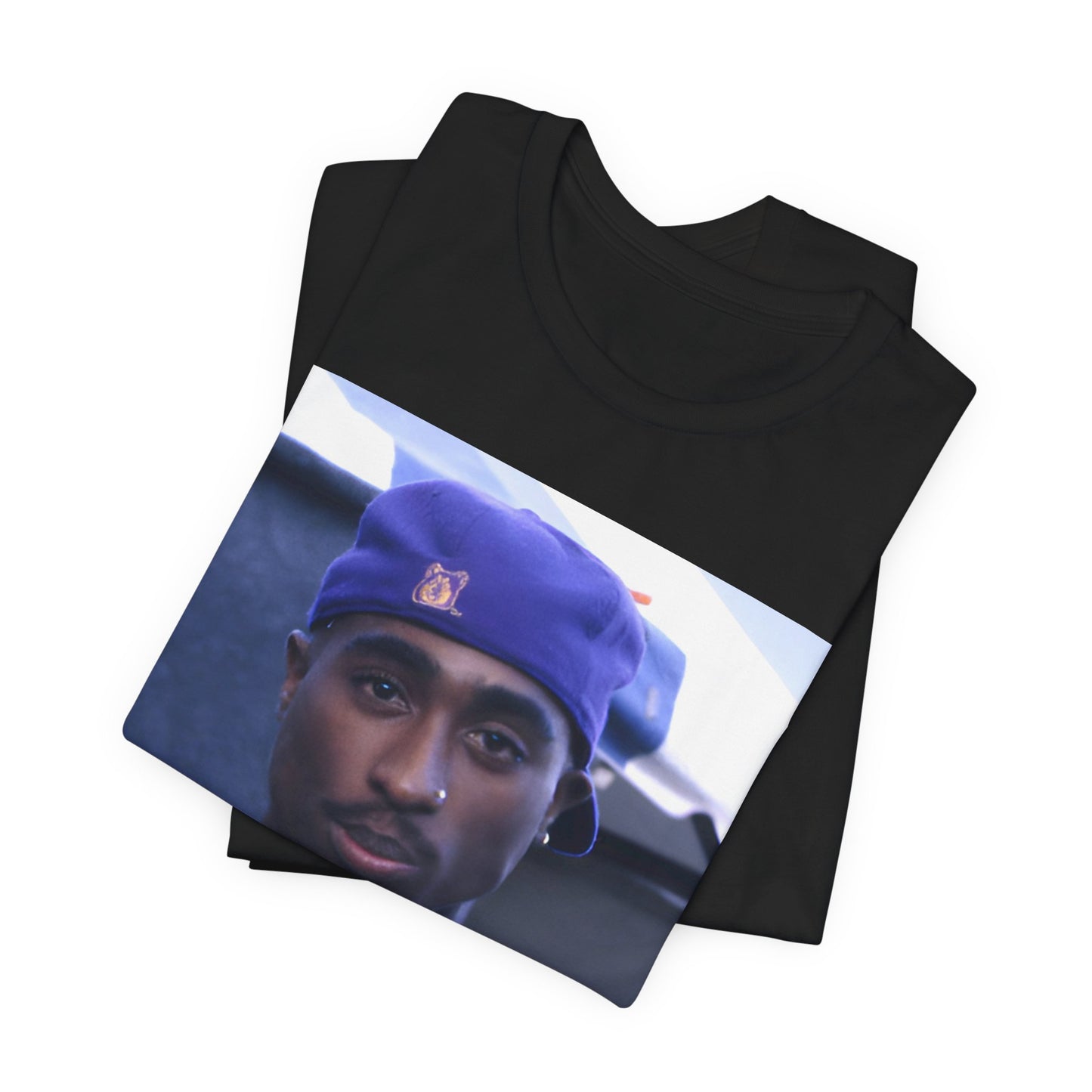 A black graphic t-shirt featuring a graphic related to Tupac's 'California Love' song or era.