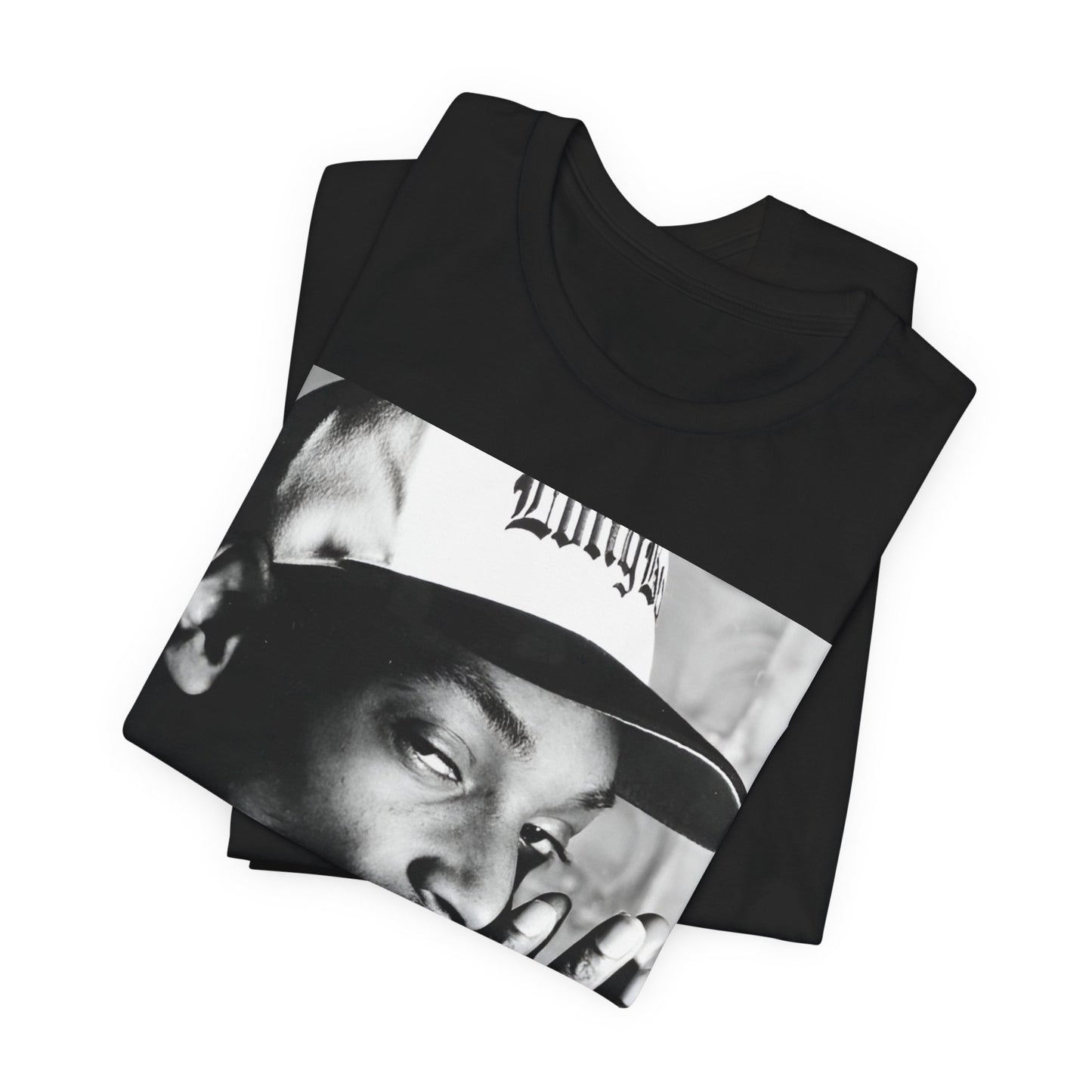 A black graphic t-shirt featuring a cool black and white graphic or photo of Snoop Dogg as a rapper.