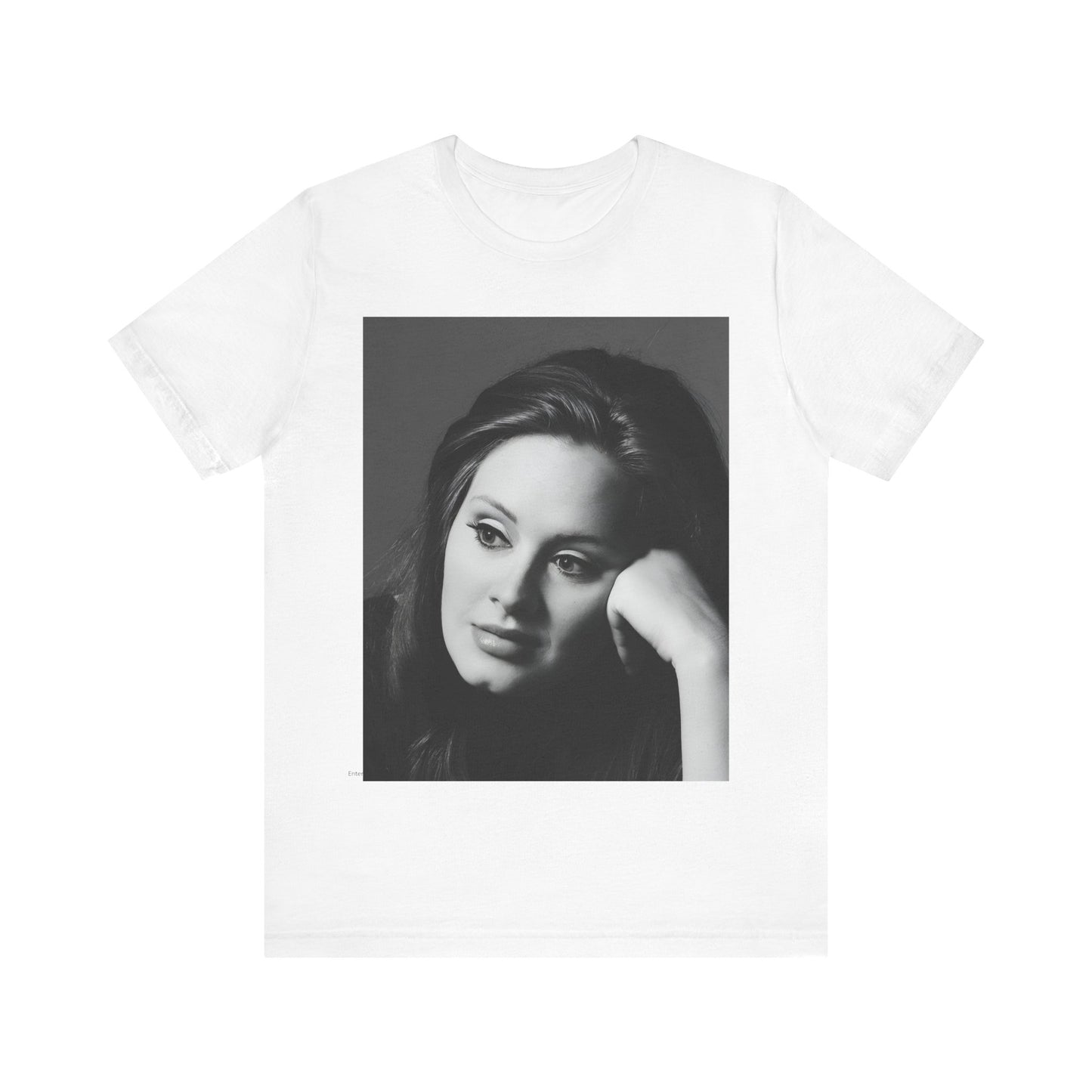 A black graphic t-shirt featuring a vintage-style black and white studio portrait of Adele, showing her with a poised and elegant expression.