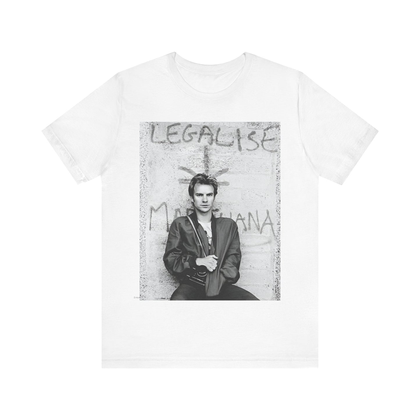 A black graphic t-shirt featuring a graphic of The Police with reggae-influenced pop elements.