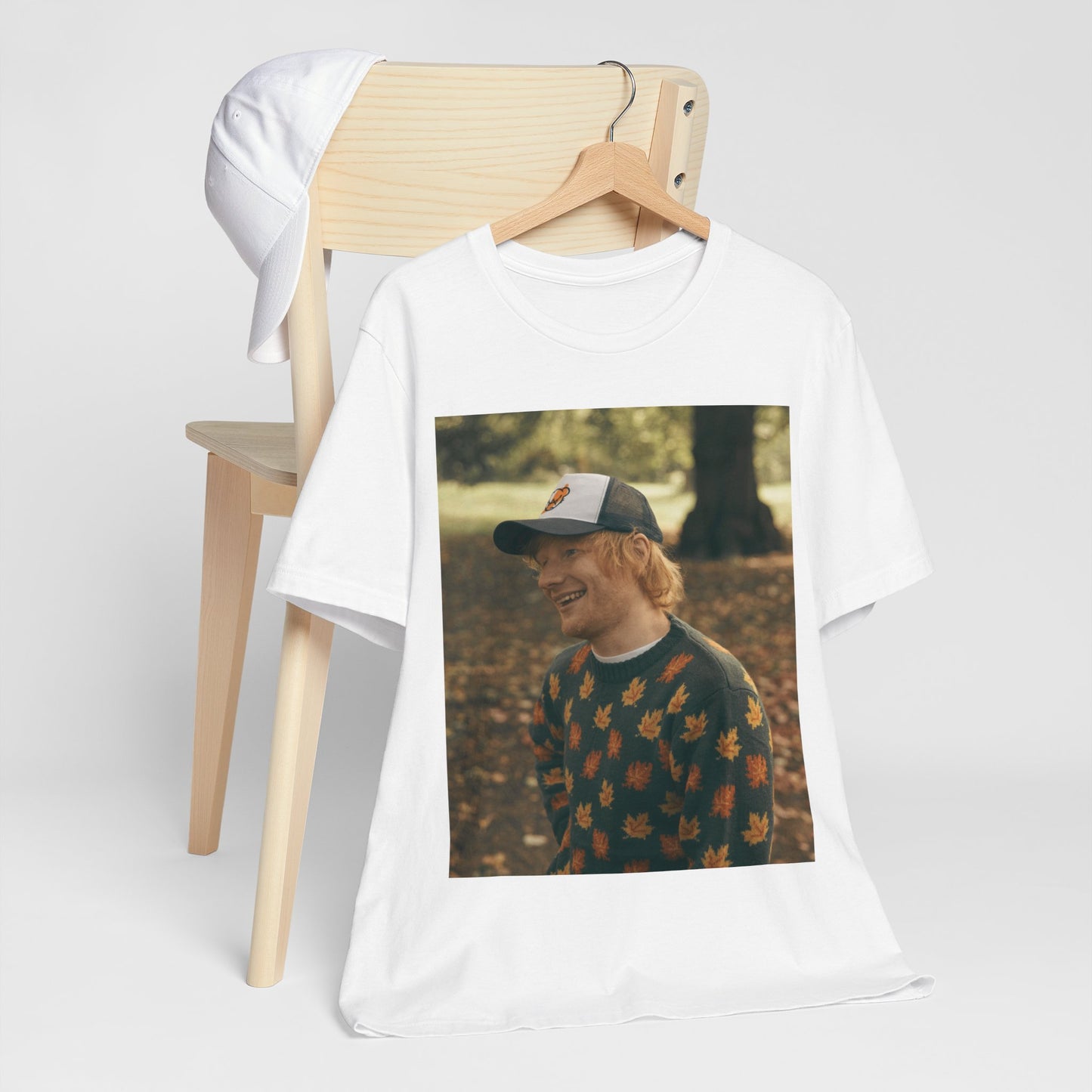 A black graphic t-shirt featuring a graphic related to Ed Sheeran's 'Shape of You' song or era.