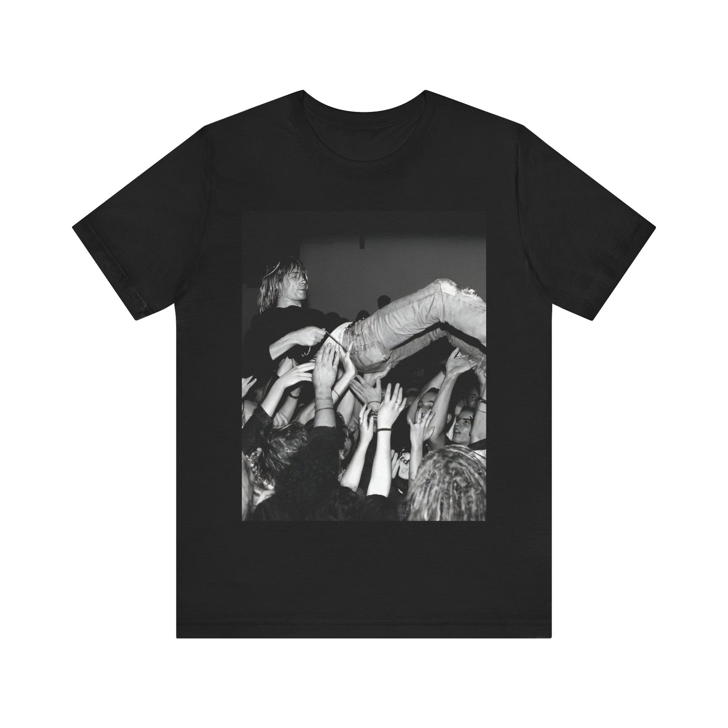 A black graphic t-shirt featuring a 90s graphic or photo of Kurt Cobain from Nirvana stage diving.