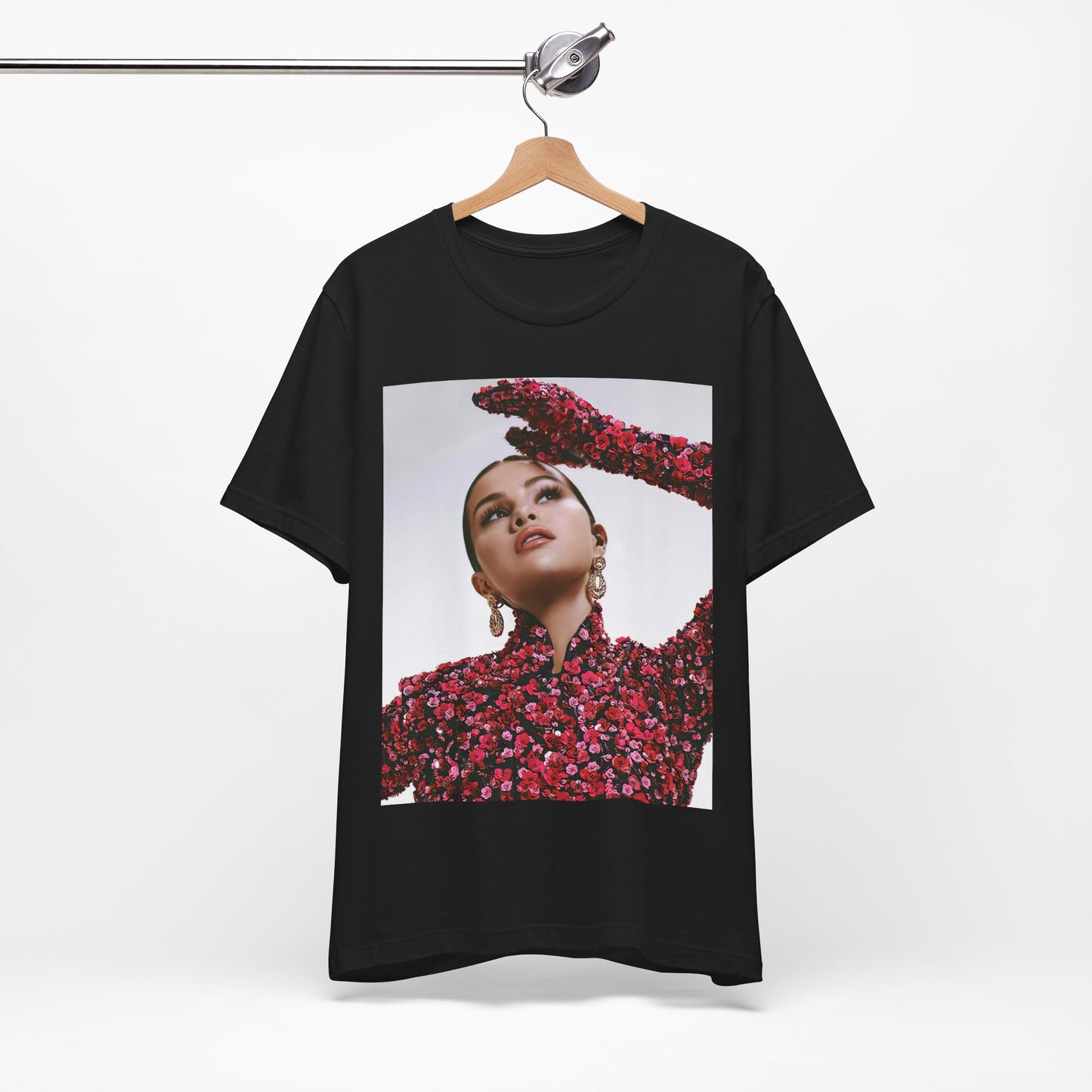 A black graphic t-shirt featuring a classic aesthetic graphic of Selena Gomez.