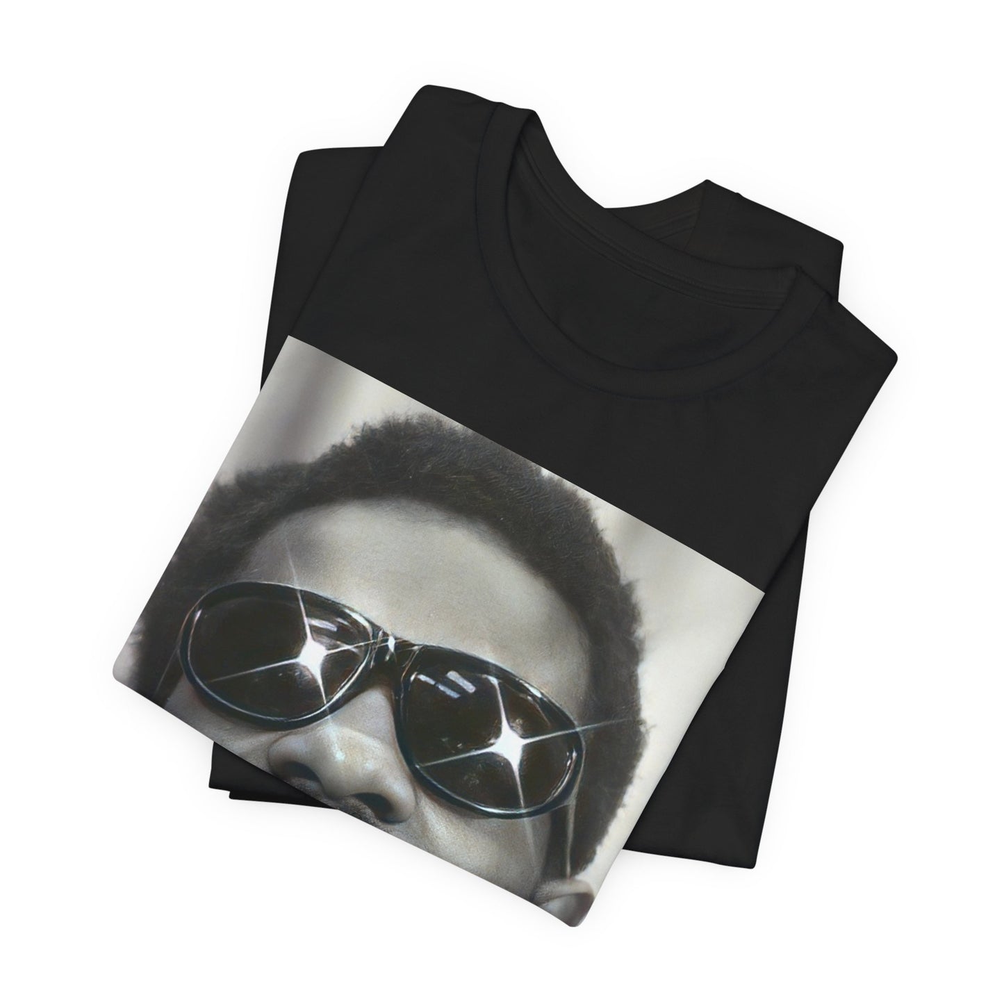 A black graphic t-shirt featuring a 70s funk aesthetic black and white graphic or photo of Stevie Wonder.
